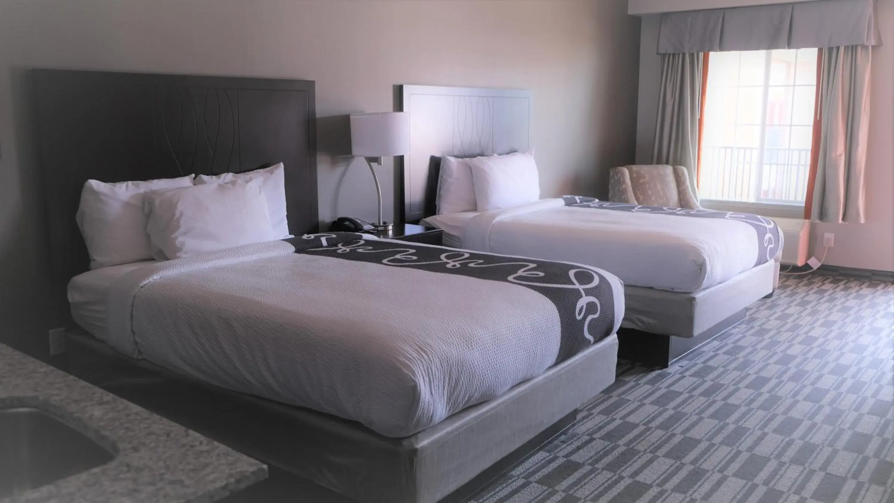 Bed in Catoosa Inn & Suites Bed in Catoosa Inn & Suites