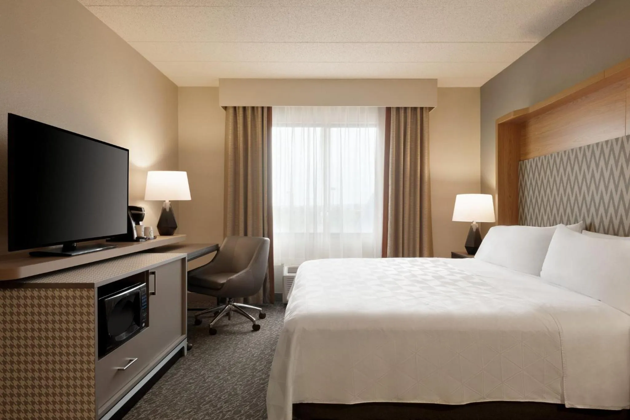 Photo of the whole room, Bed in Holiday Inn Hotel & Suites Council Bluffs by IHG