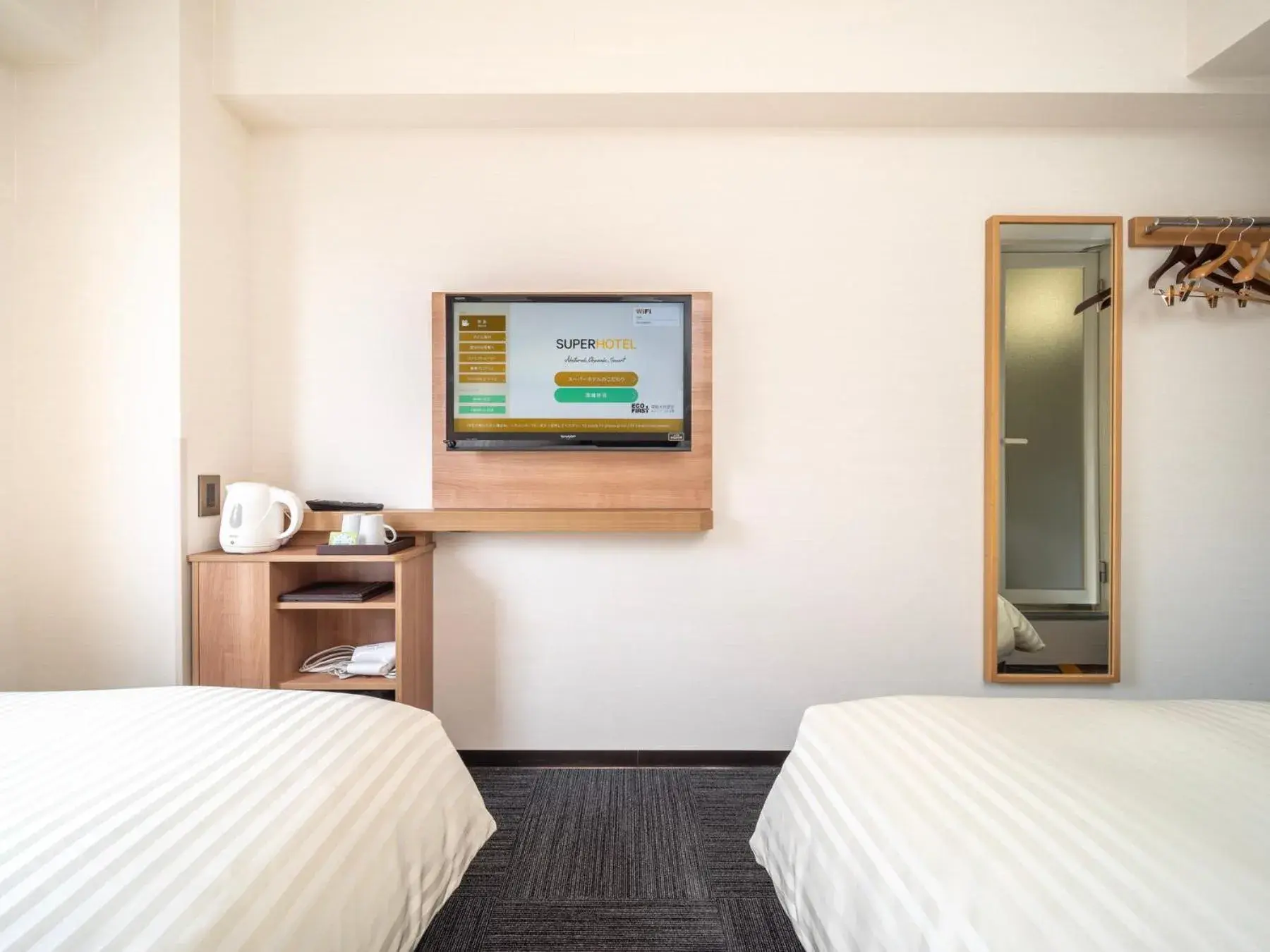 Bed in Super Hotel Yamaguchi Yuda Onsen Bed in Super Hotel Yamaguchi Yuda Onsen
