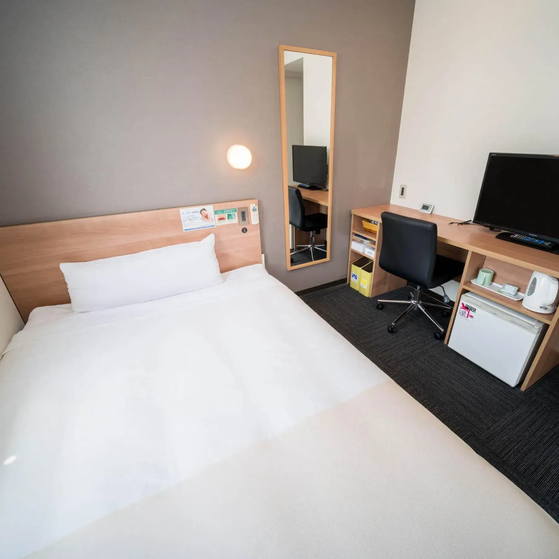 Bed in Super Hotel Yamaguchi Yuda Onsen Bed in Super Hotel Yamaguchi Yuda Onsen