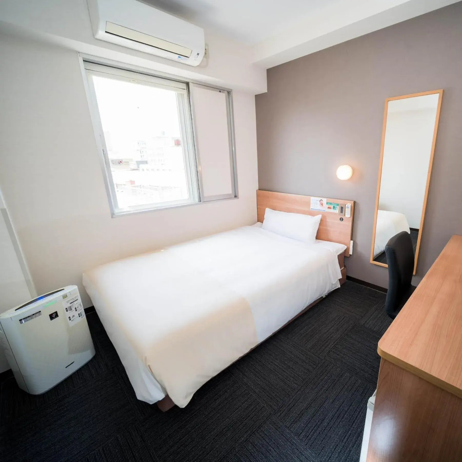 Bed in Super Hotel Yamaguchi Yuda Onsen Bed in Super Hotel Yamaguchi Yuda Onsen