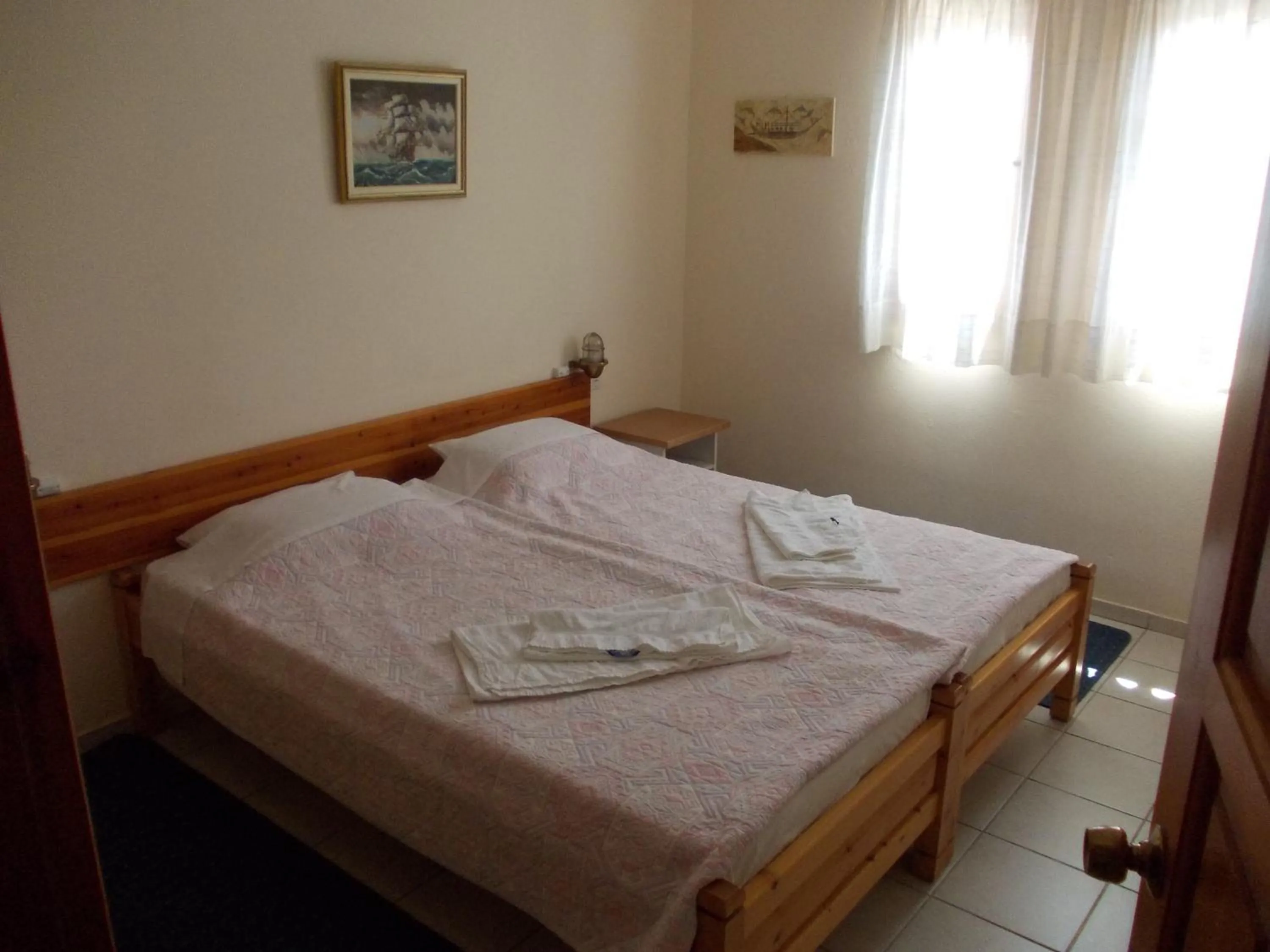 Property building, Bed in Philippos Apartments