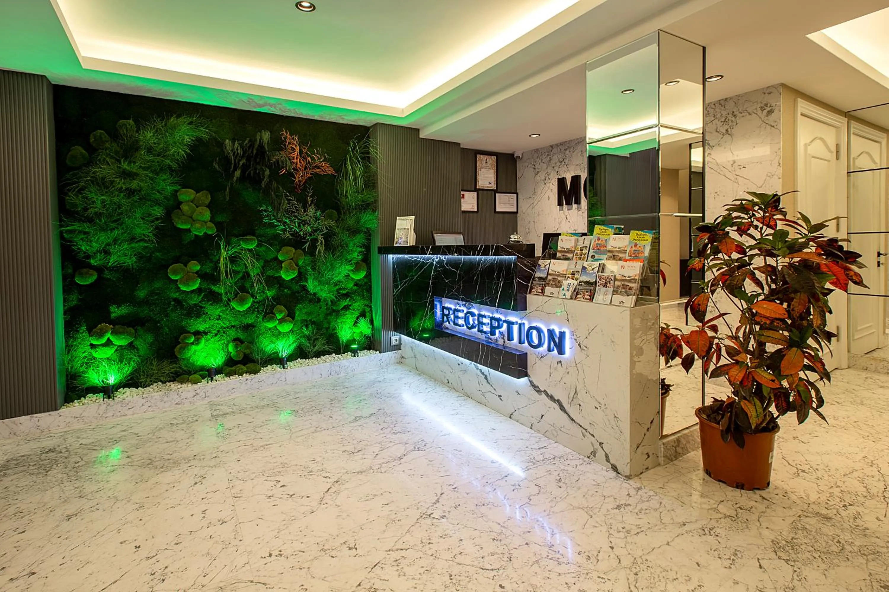 Lobby or reception in Moss Suites Hotel