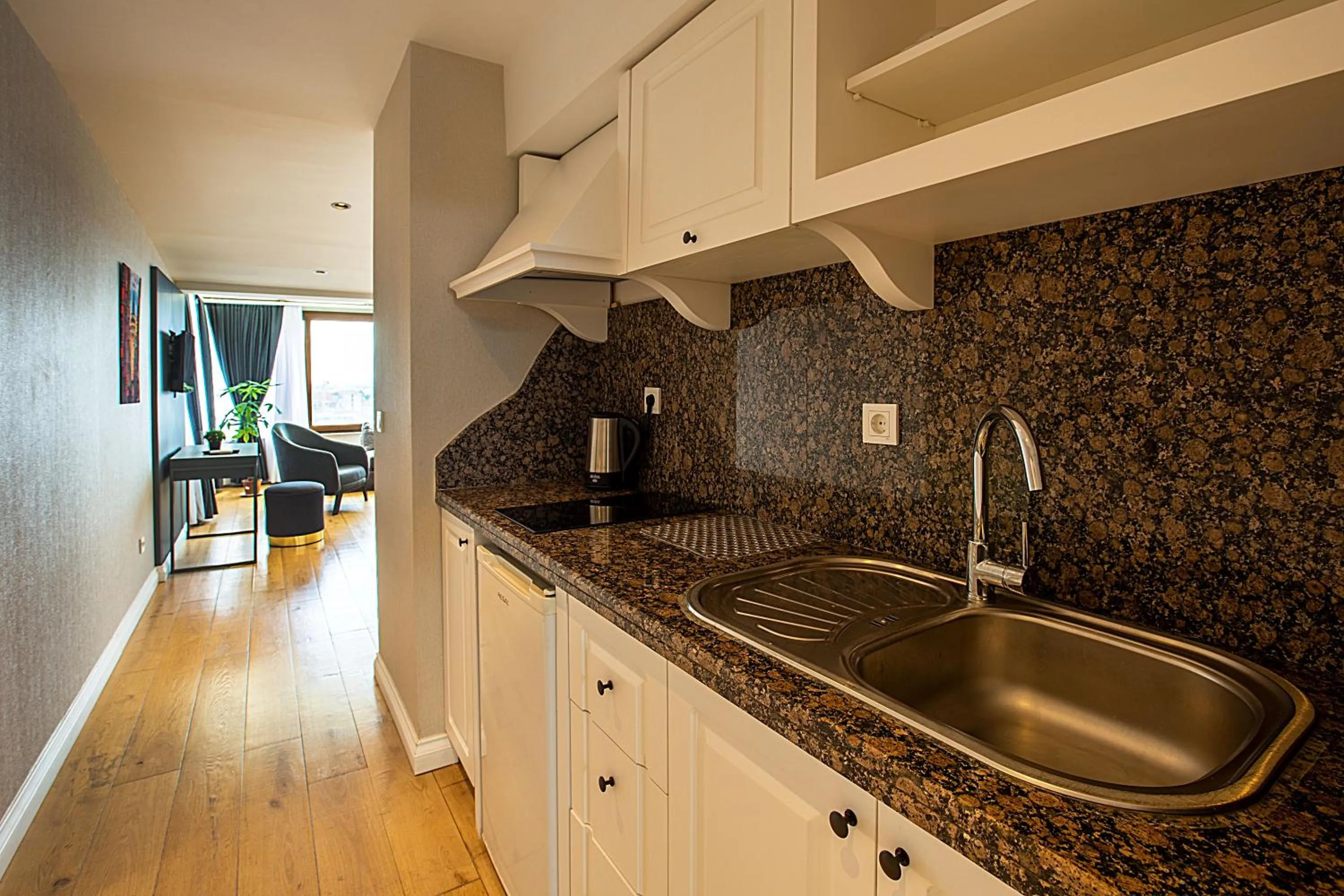 Kitchen or kitchenette in Moss Suites Hotel