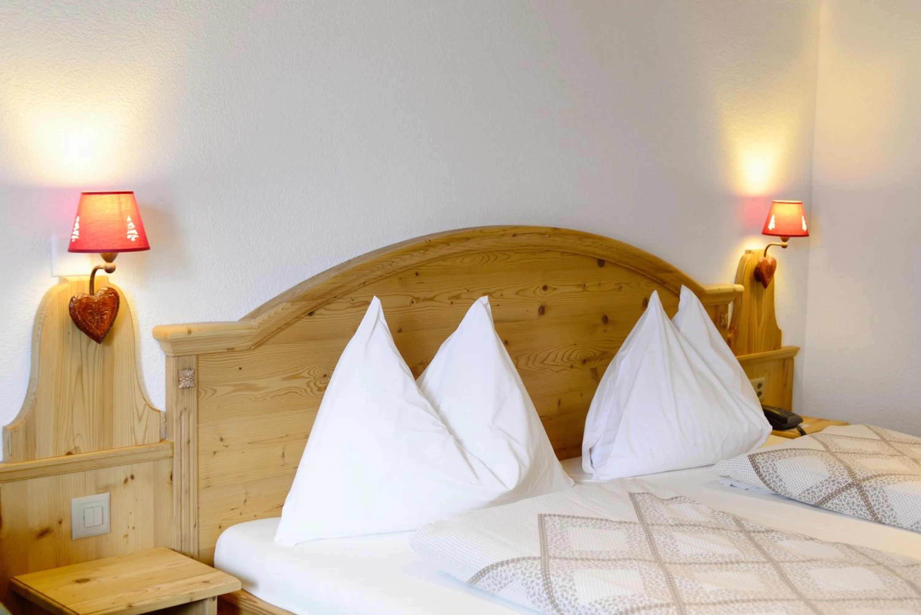 Bed in Hotel Restaurant Alpina