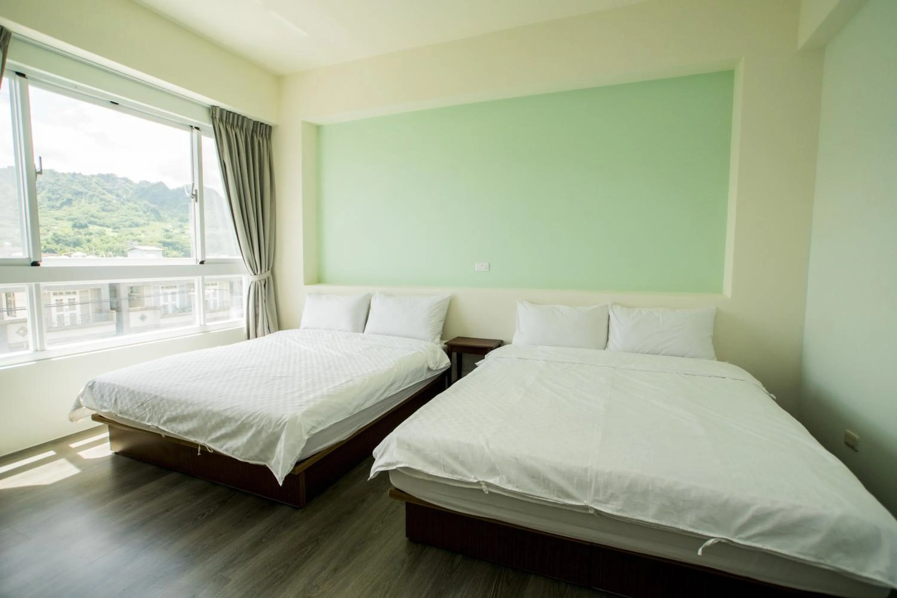 Bed in Siang Jhan B&B