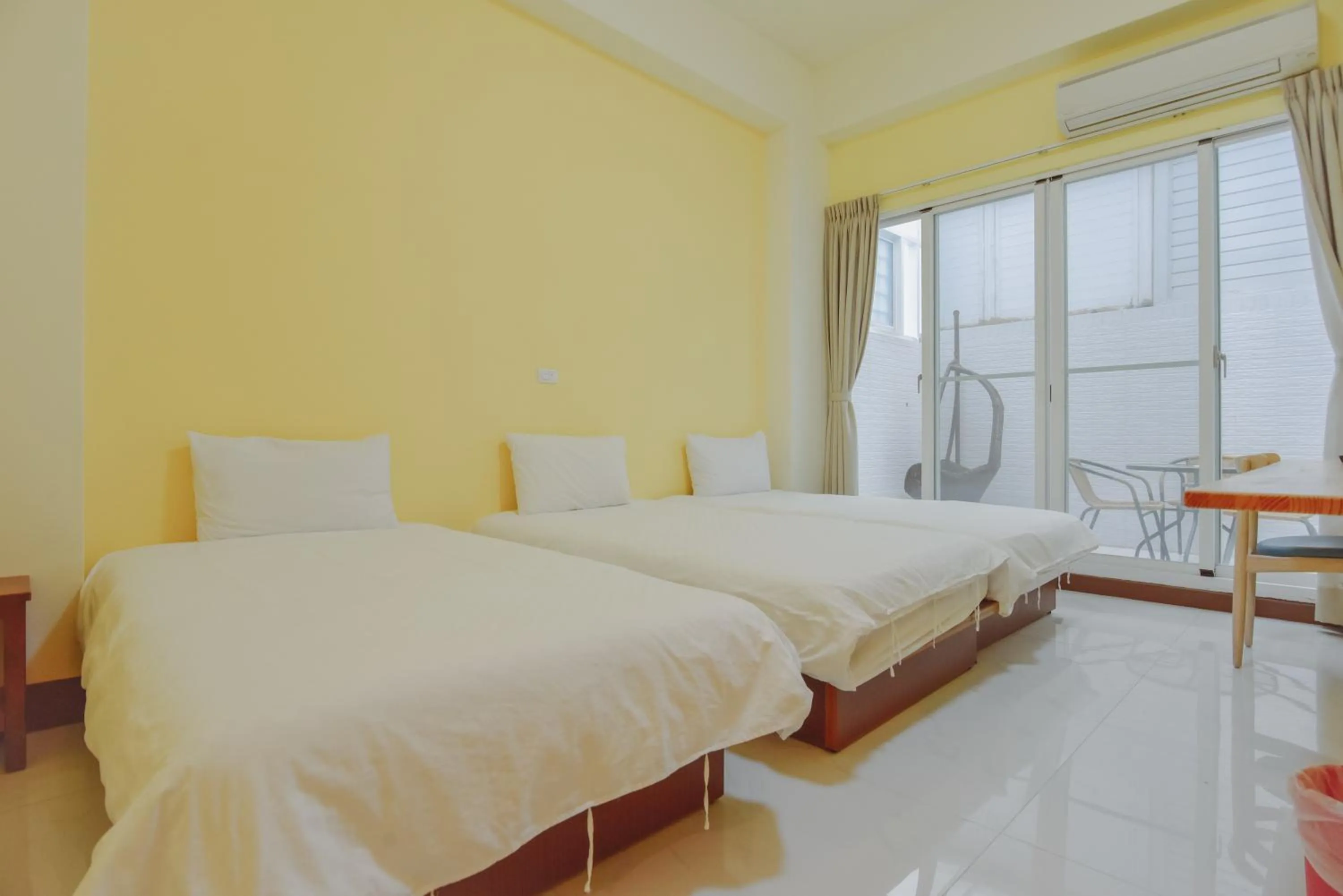 Bed in Siang Jhan B&B