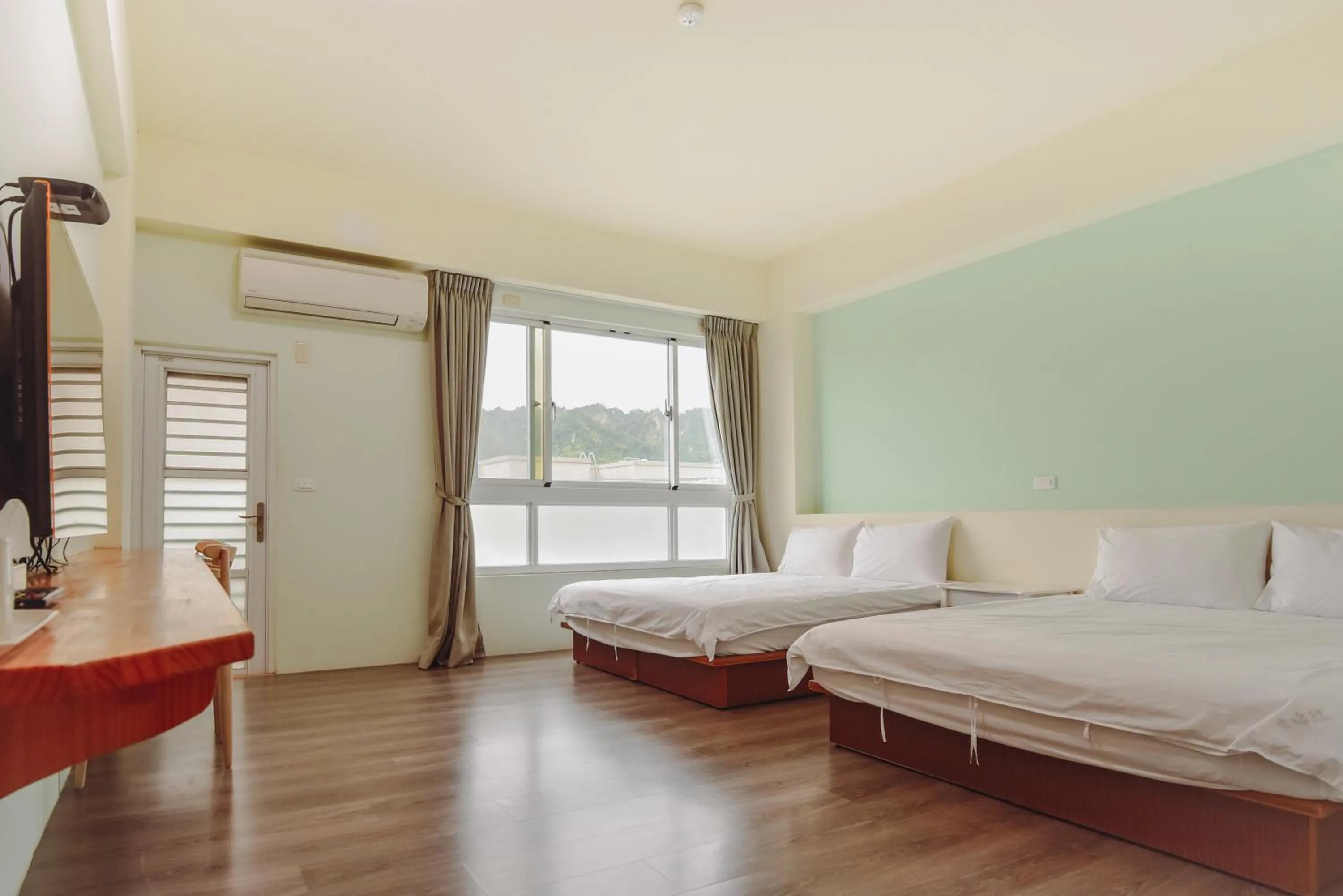 Bed in Siang Jhan B&B