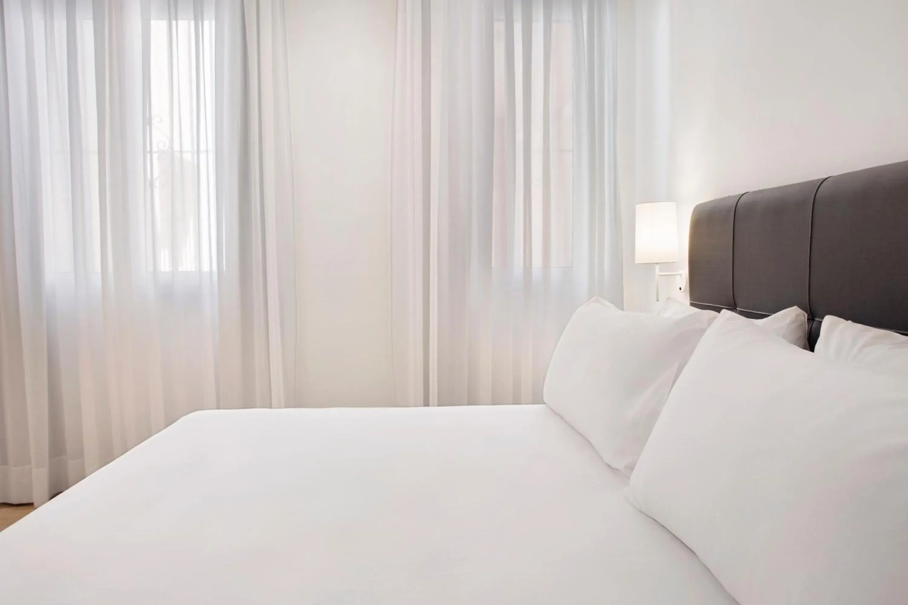 Bed in Apartamentos Metrópolis Bed in Apartamentos Metrópolis