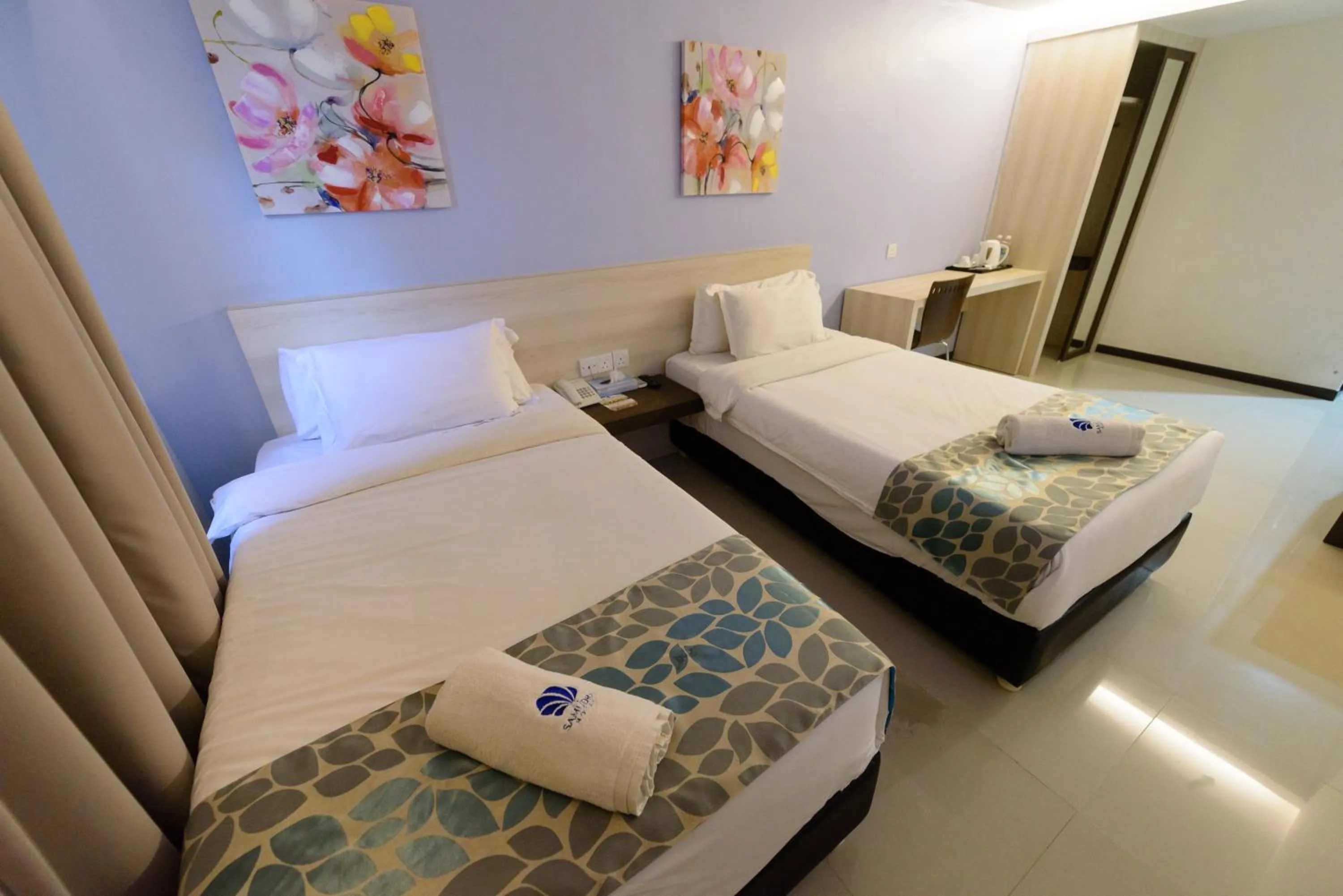 Bed in Samudra Hotel Kuching