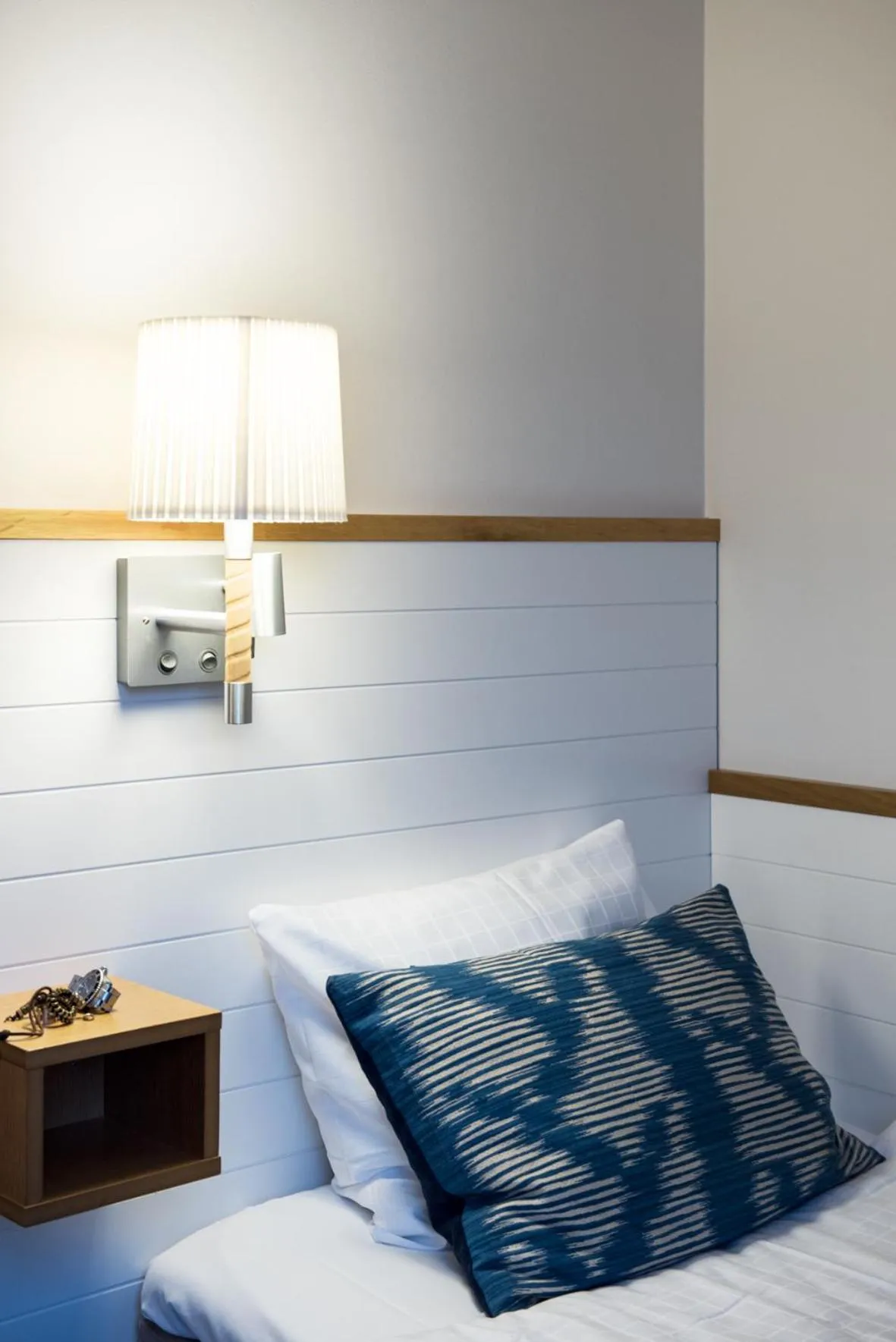 Decorative detail, Bed in Home Hotel Smedjan