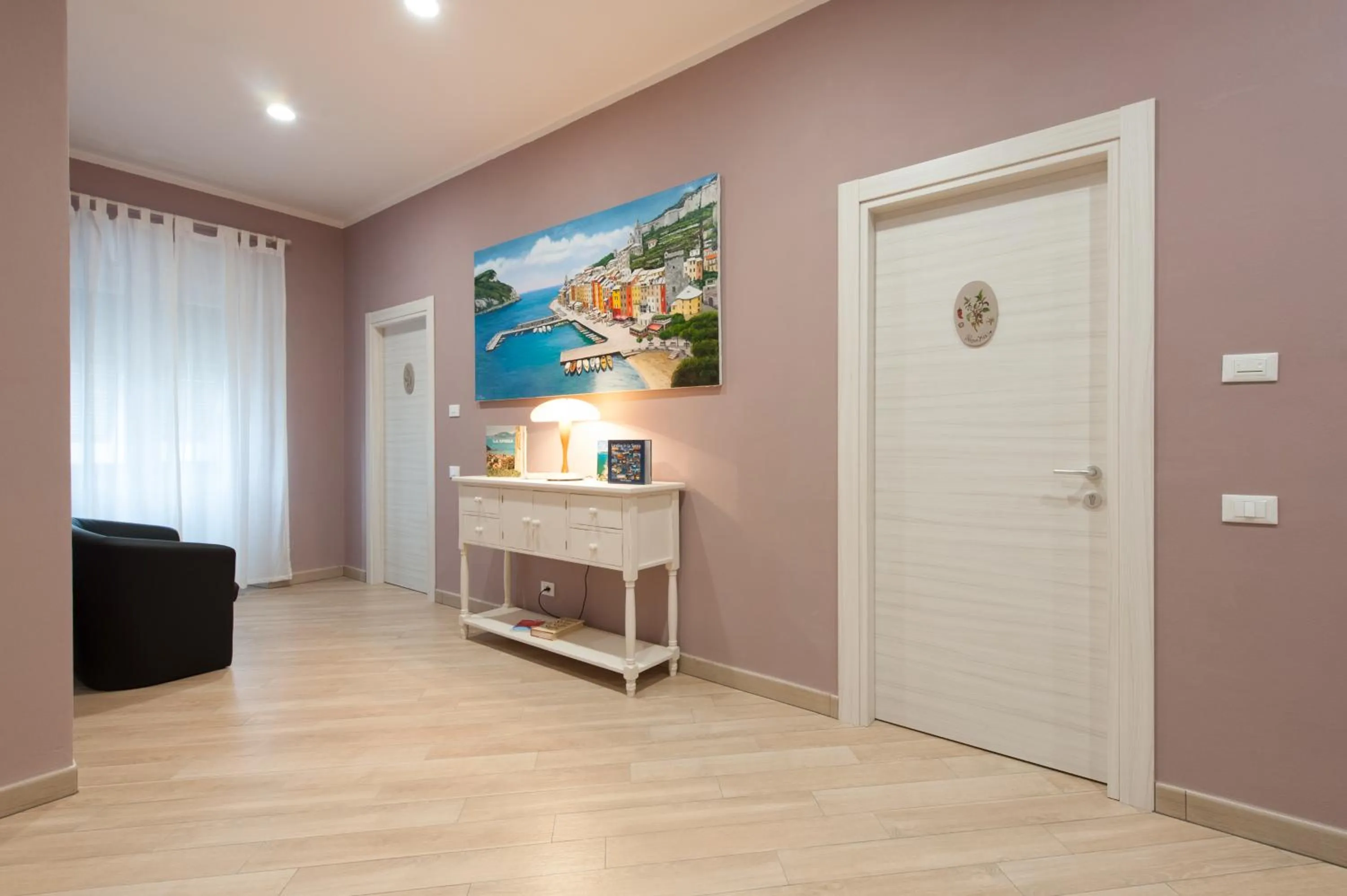 Communal lounge/ TV room in Guest House Le Tre Spezie