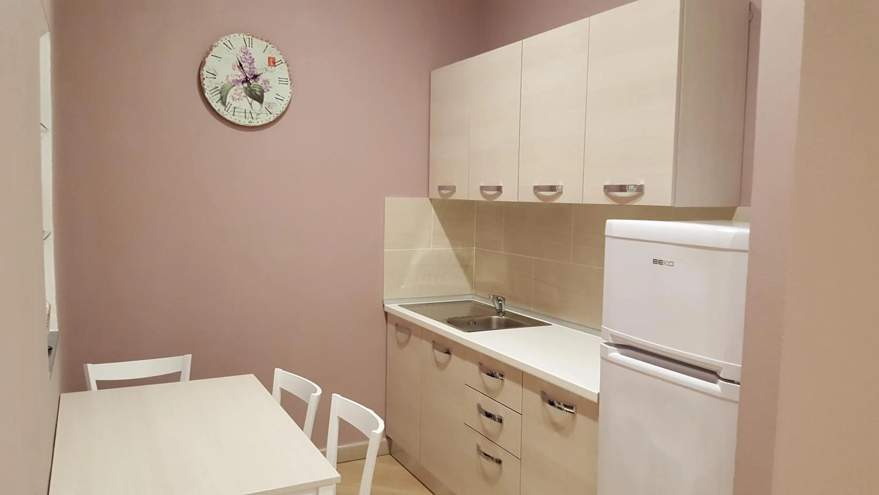 Communal kitchen in Guest House Le Tre Spezie