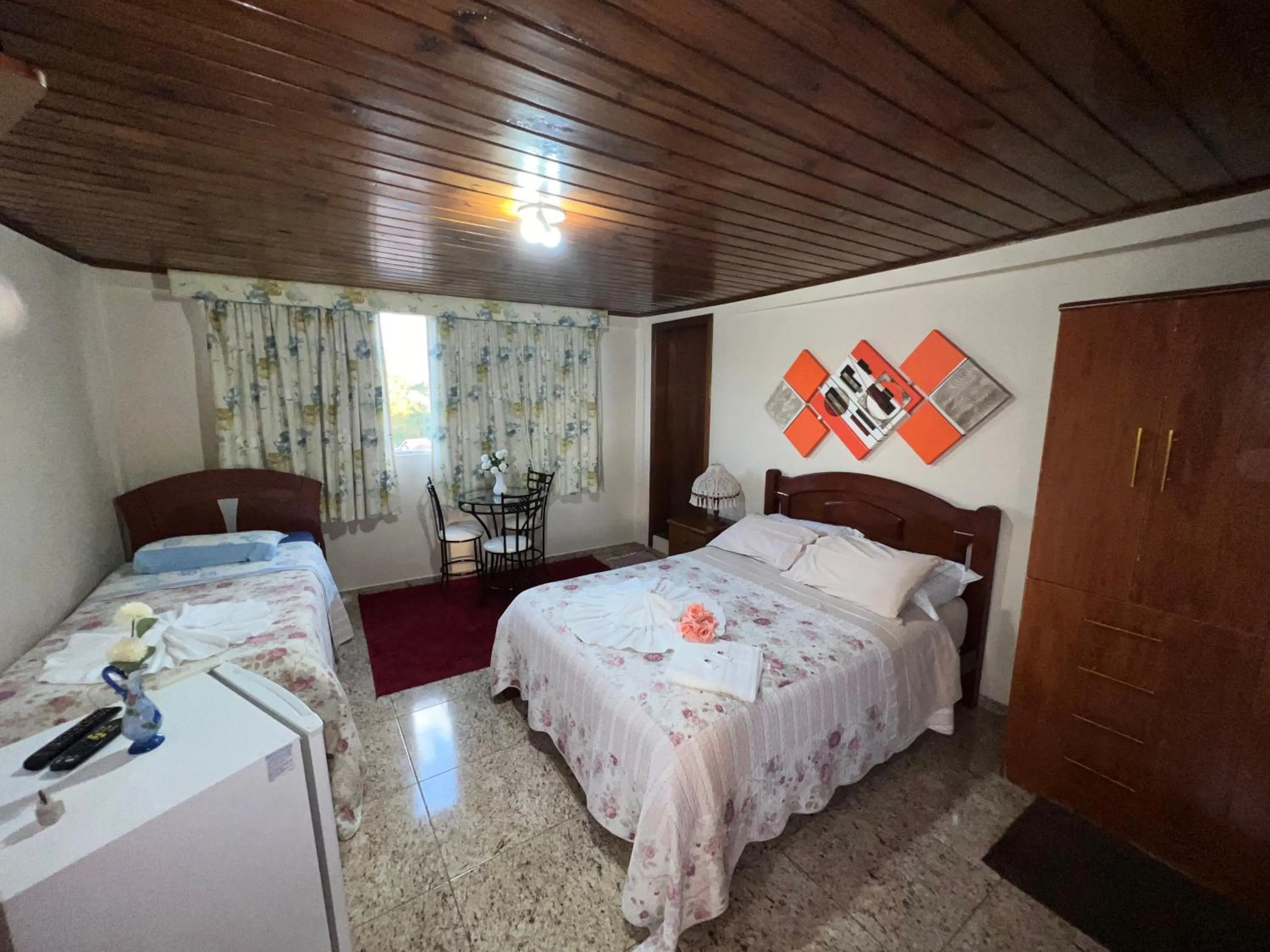 Bed in Pousada Heron