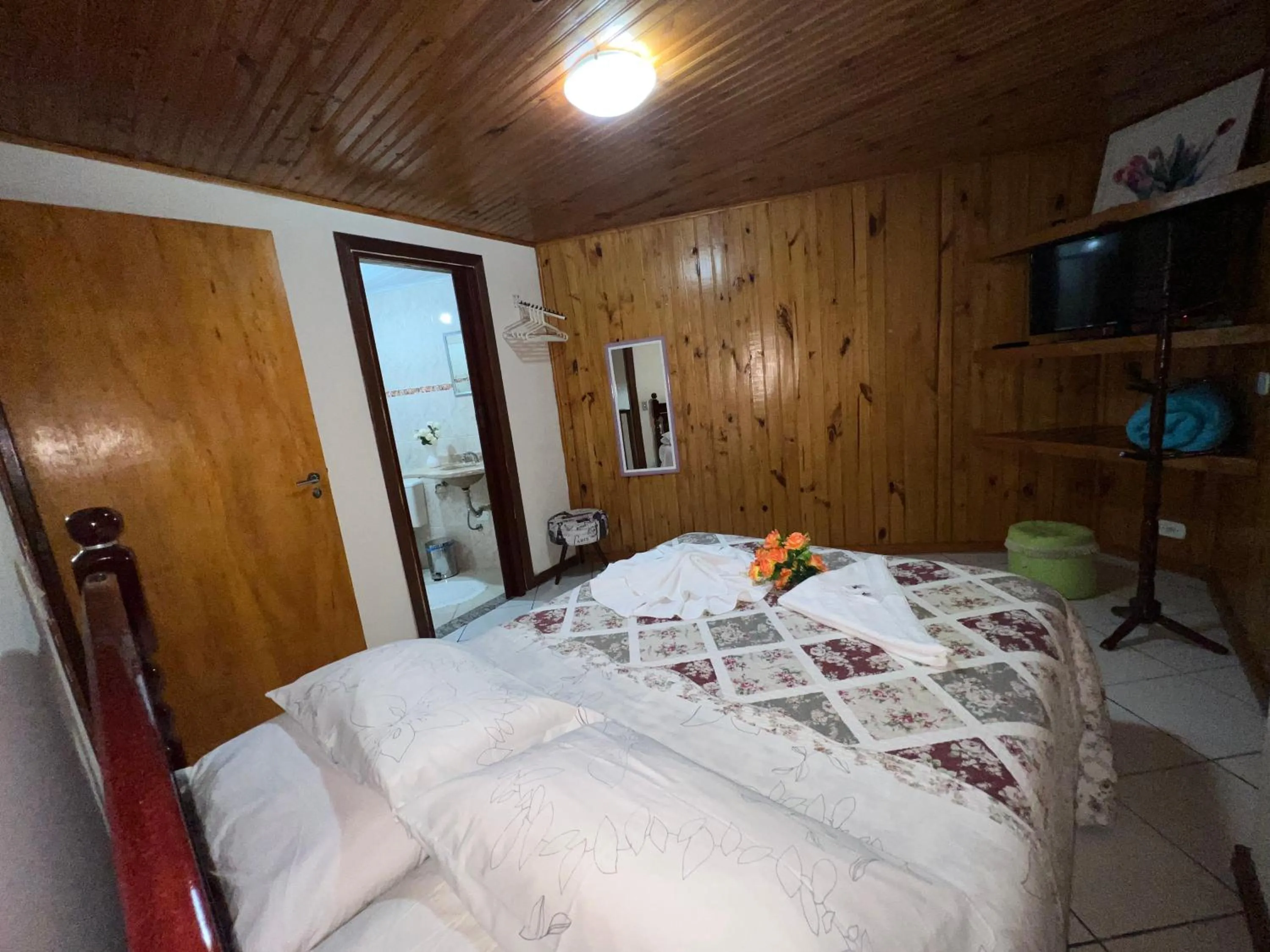 Bed in Pousada Heron