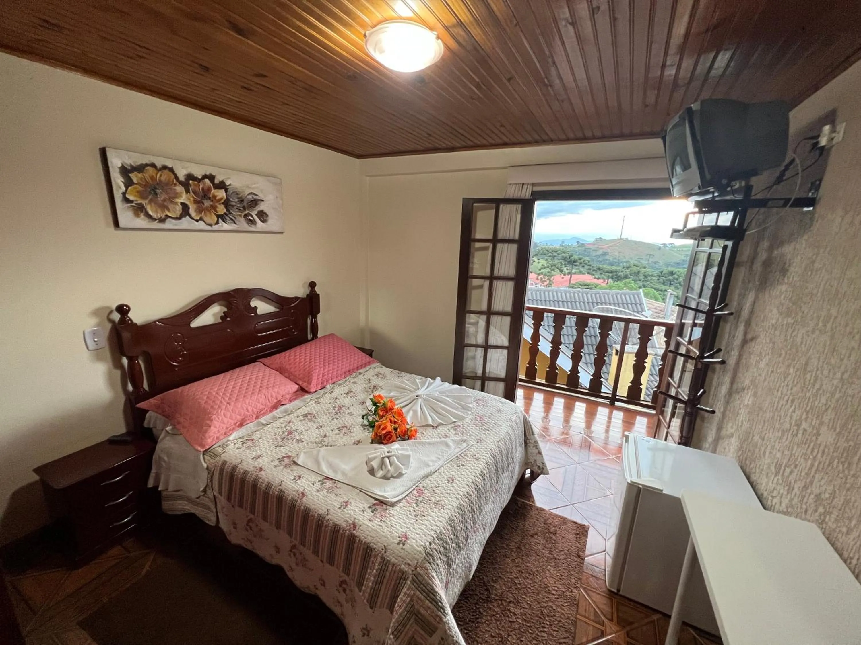 Bed in Pousada Heron