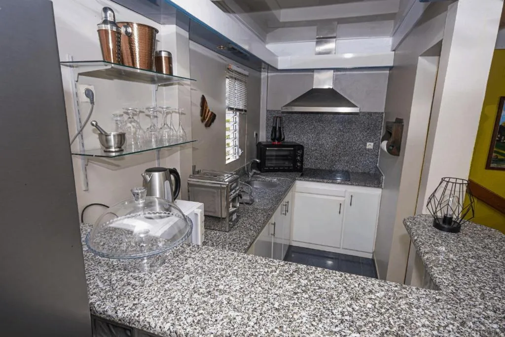 Kitchen or kitchenette in Redoute Paradise