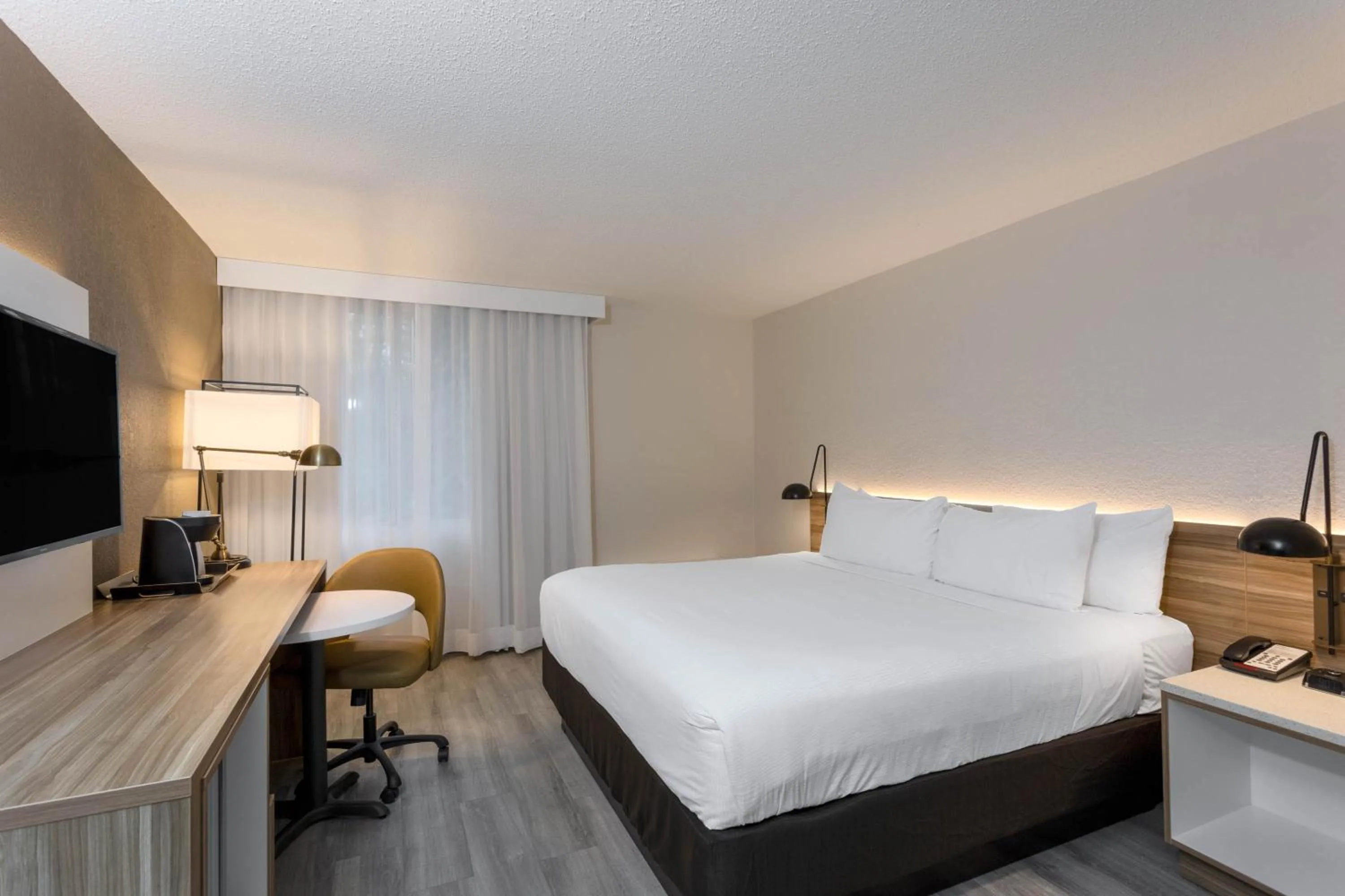 Bedroom, Bed in Wyndham Garden Tallahassee Capitol Near FSU