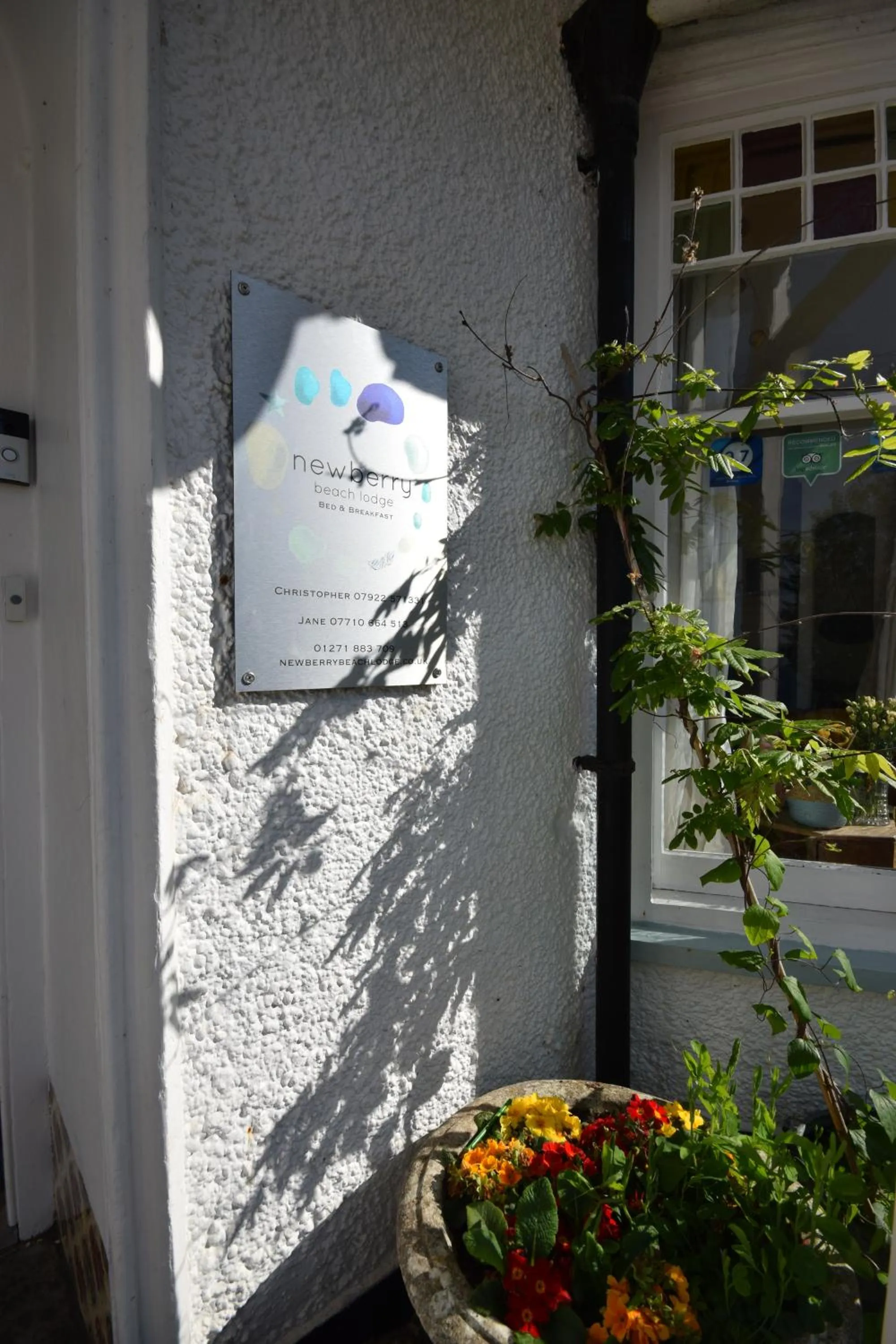 Property logo or sign in Newberry Beach lodge