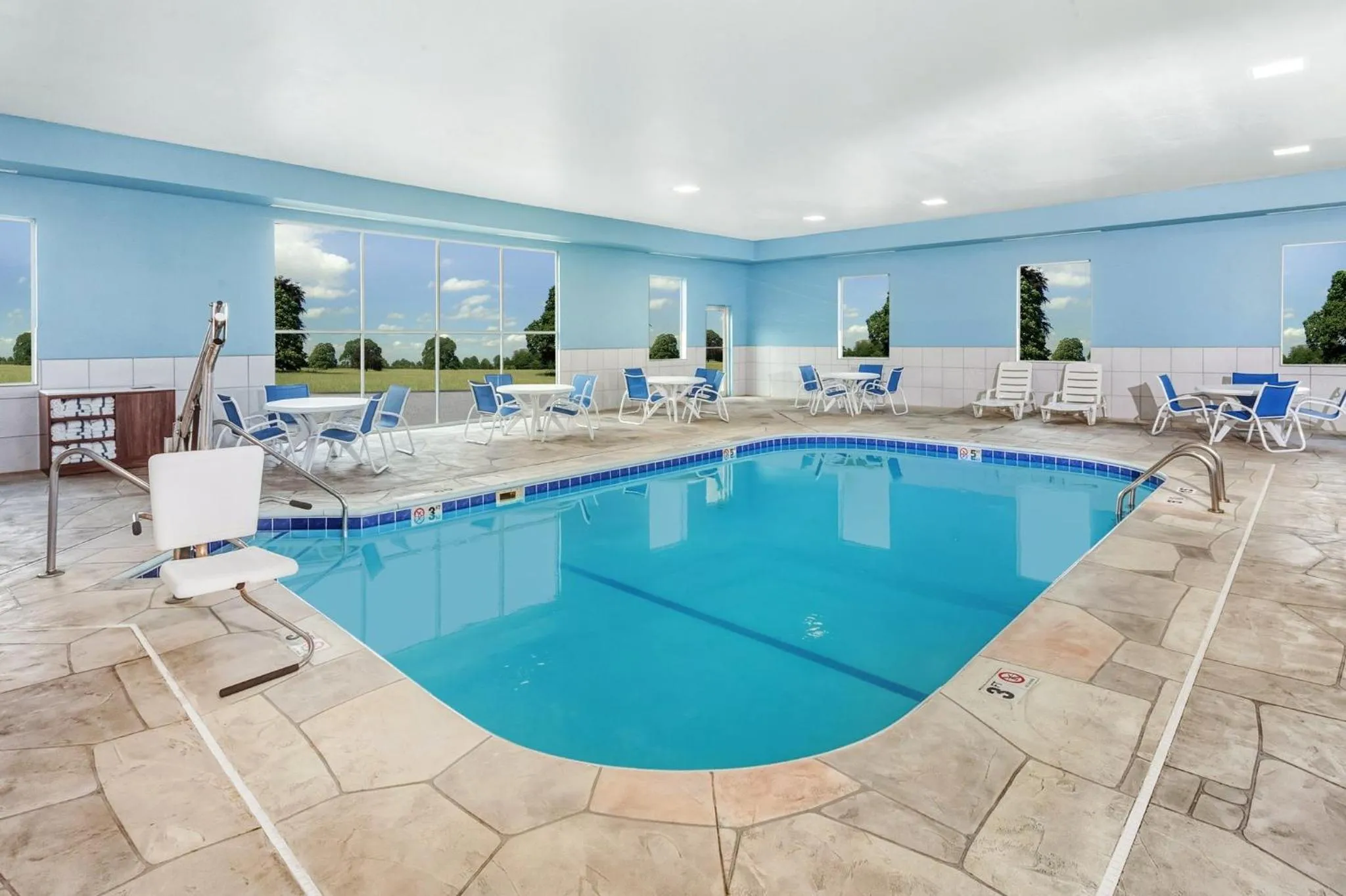 Swimming pool in Holiday Inn Express Hotel & Suites Bloomington-Normal University Area by IHG