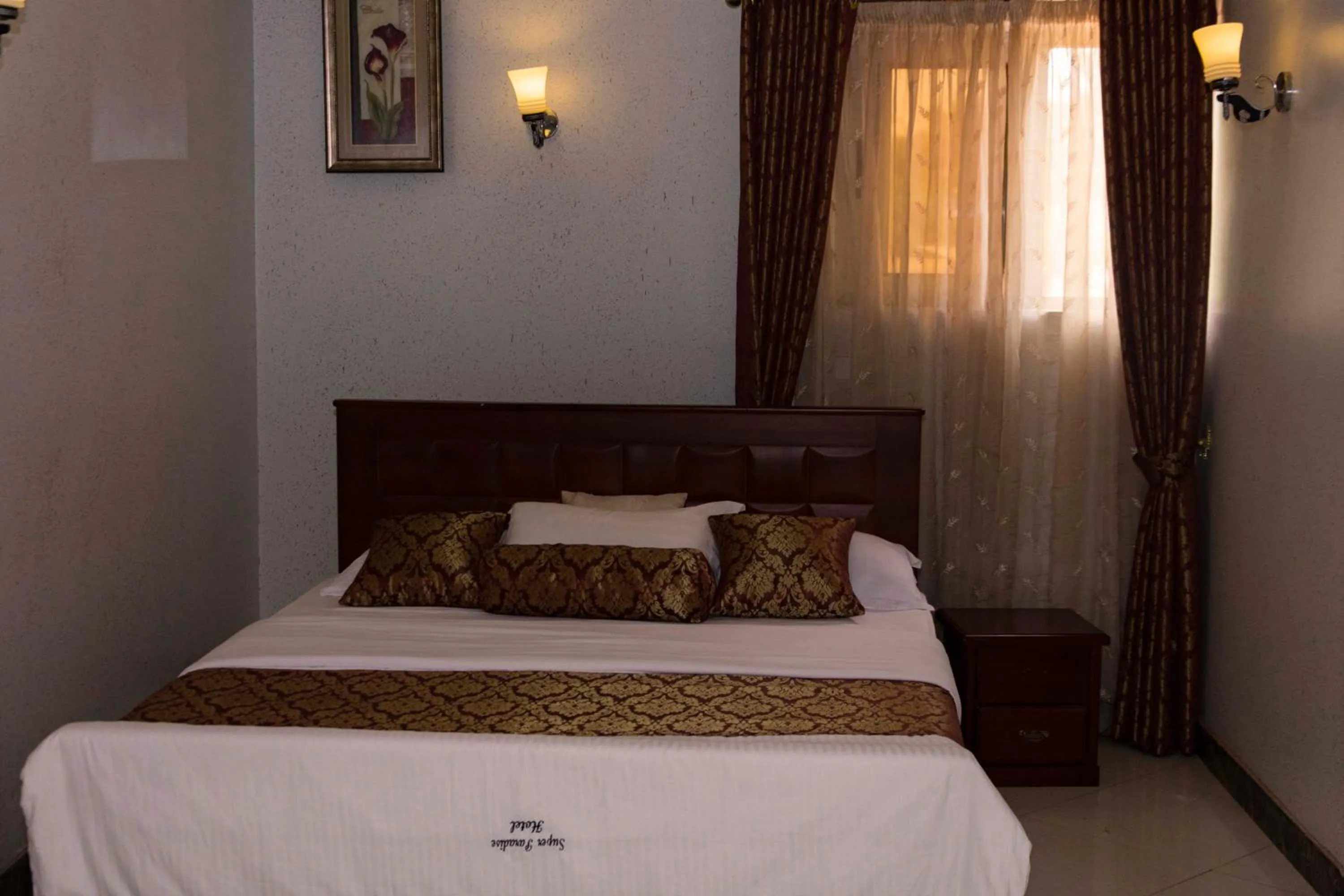 Bed in Super Paradise Hotel