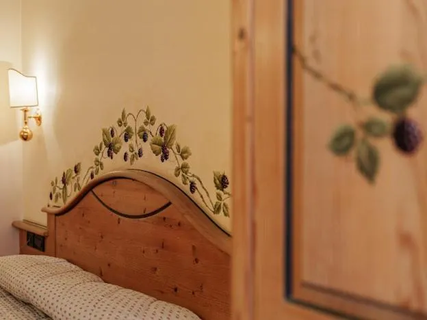 Bed in Hotel Garnì La Montanara