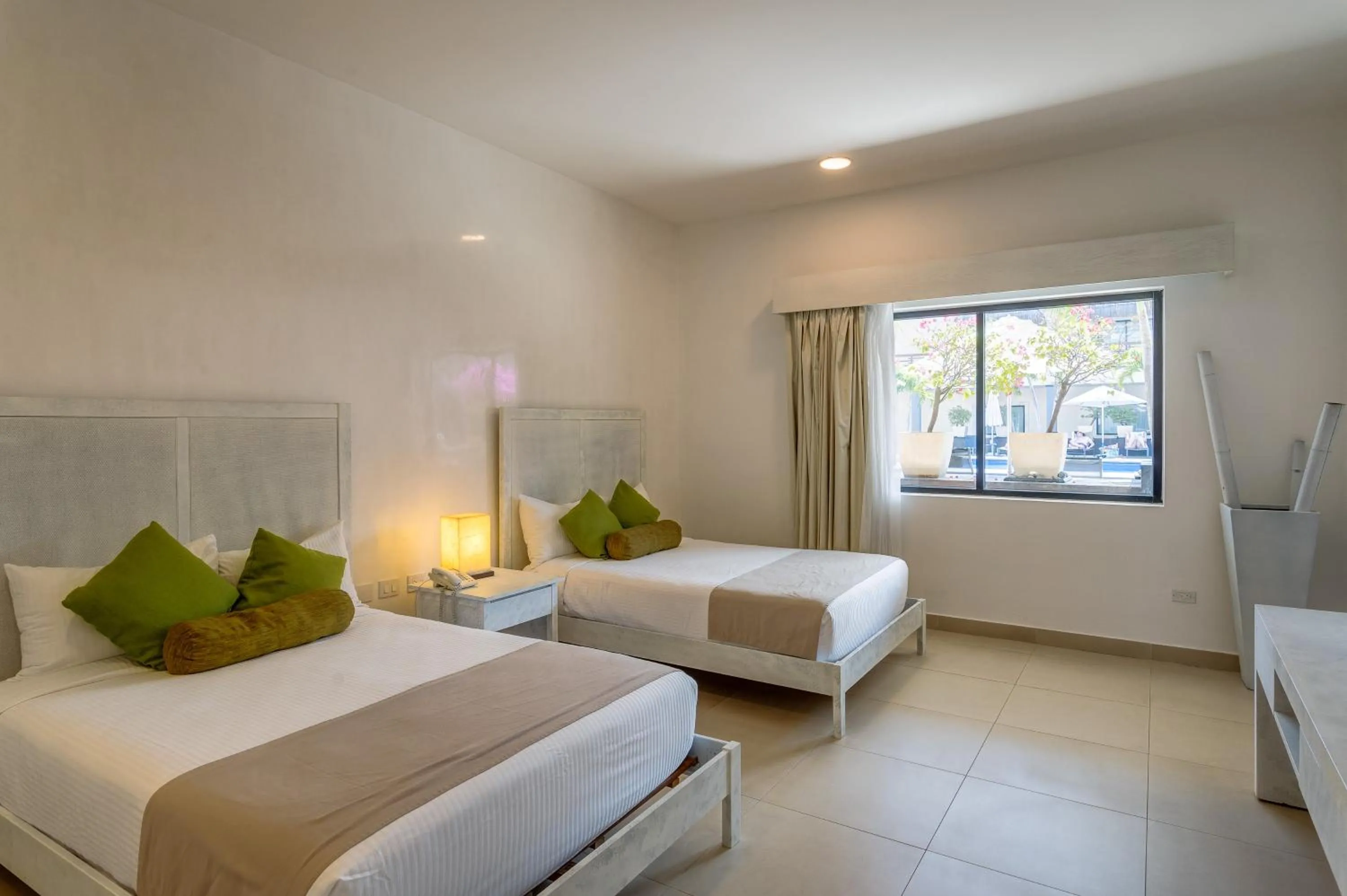 Bed in Aldea Thai by Mistik Vacation Rentals