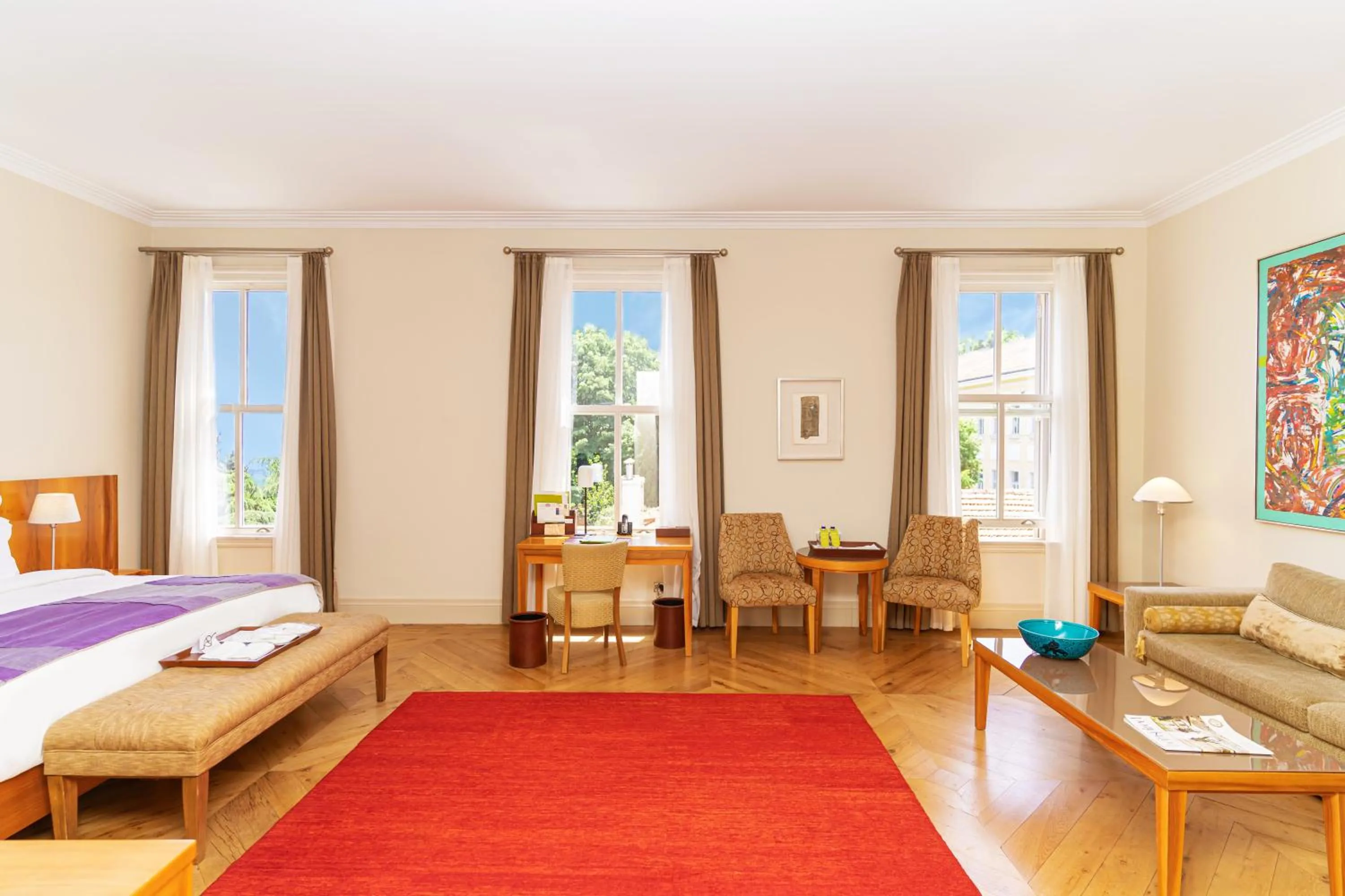 Photo of the whole room, Bed in Tomtom Suites