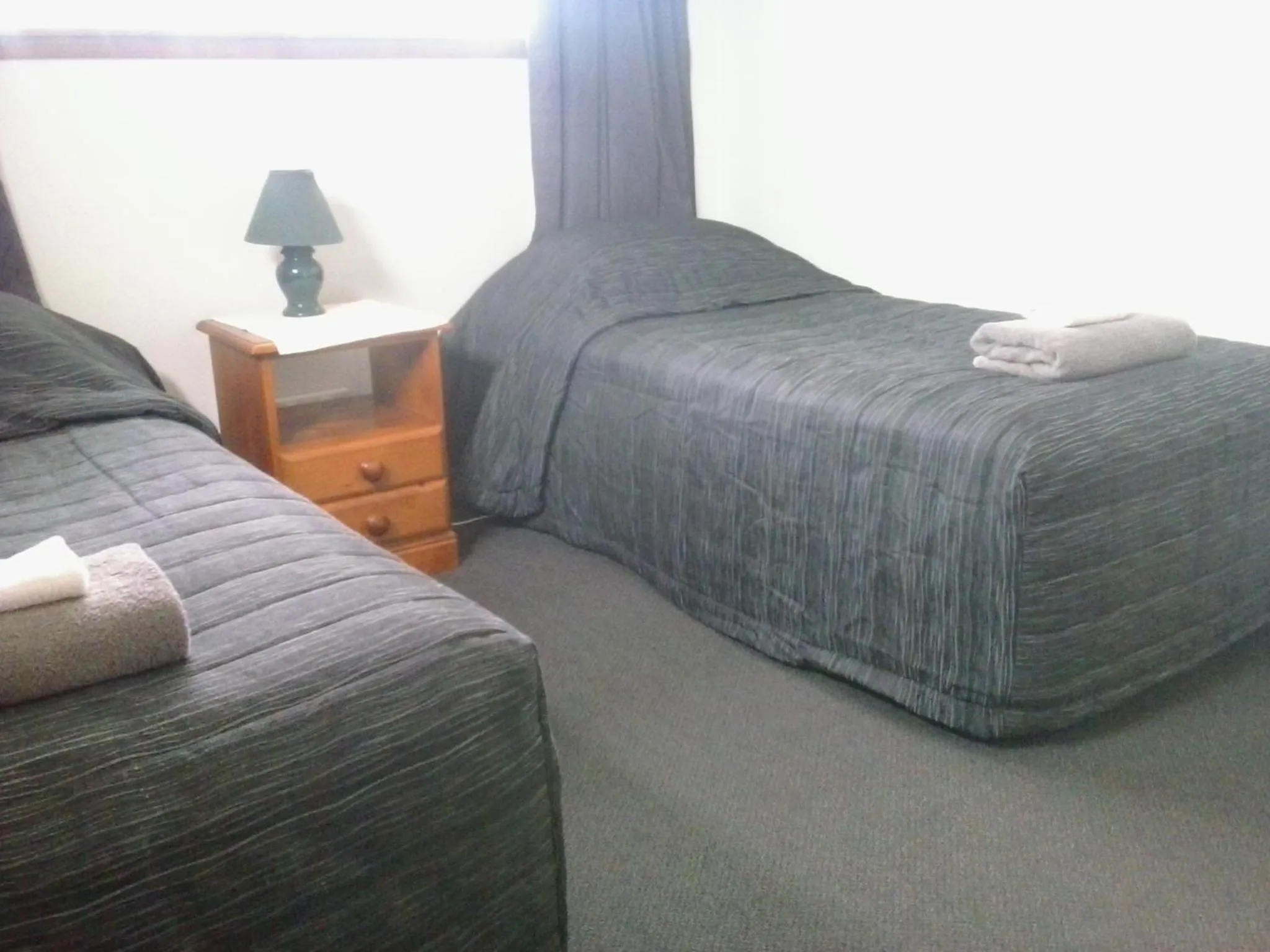 Bed in Rangiora Lodge Motel