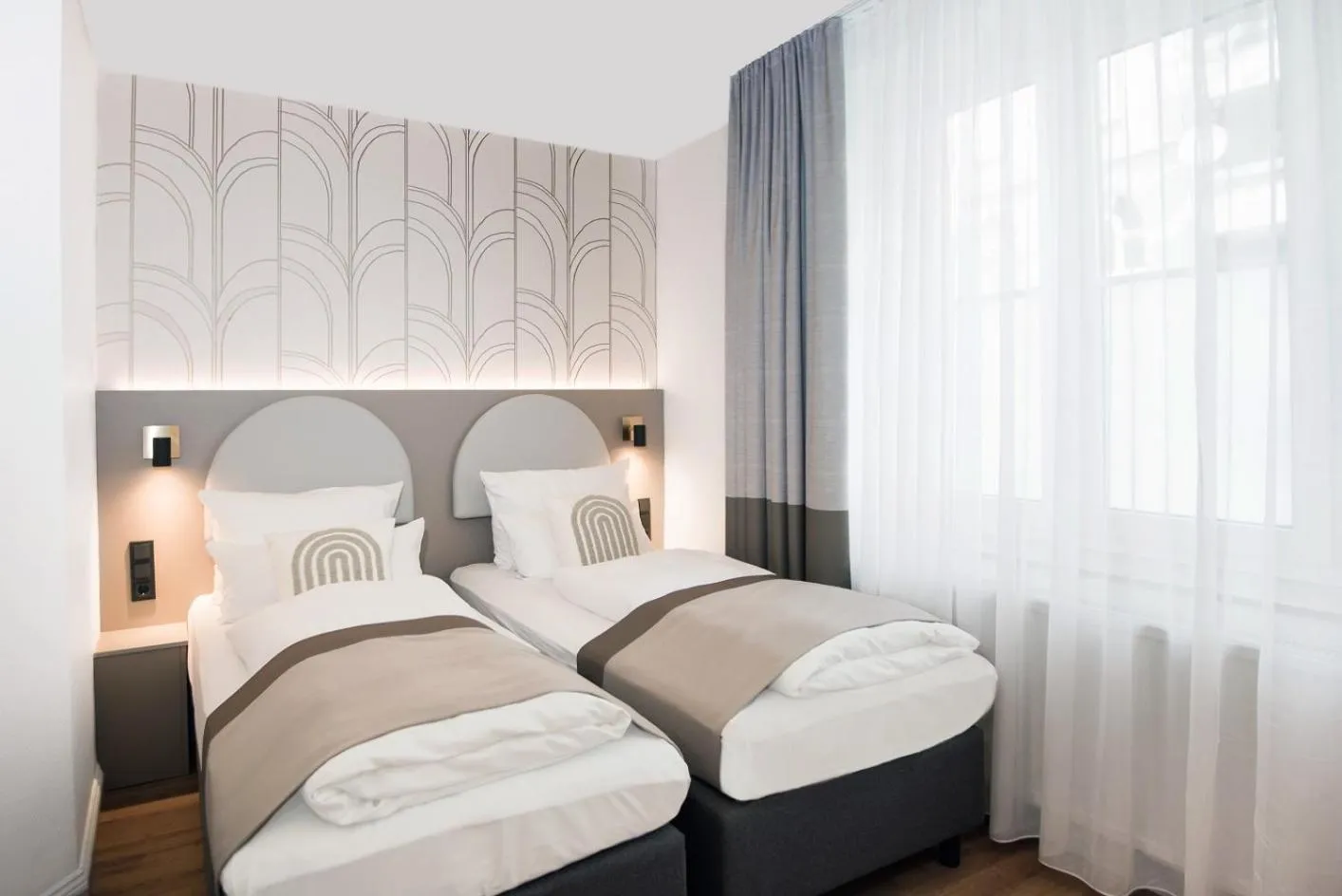 Bed in guestified LIYANA Hotel