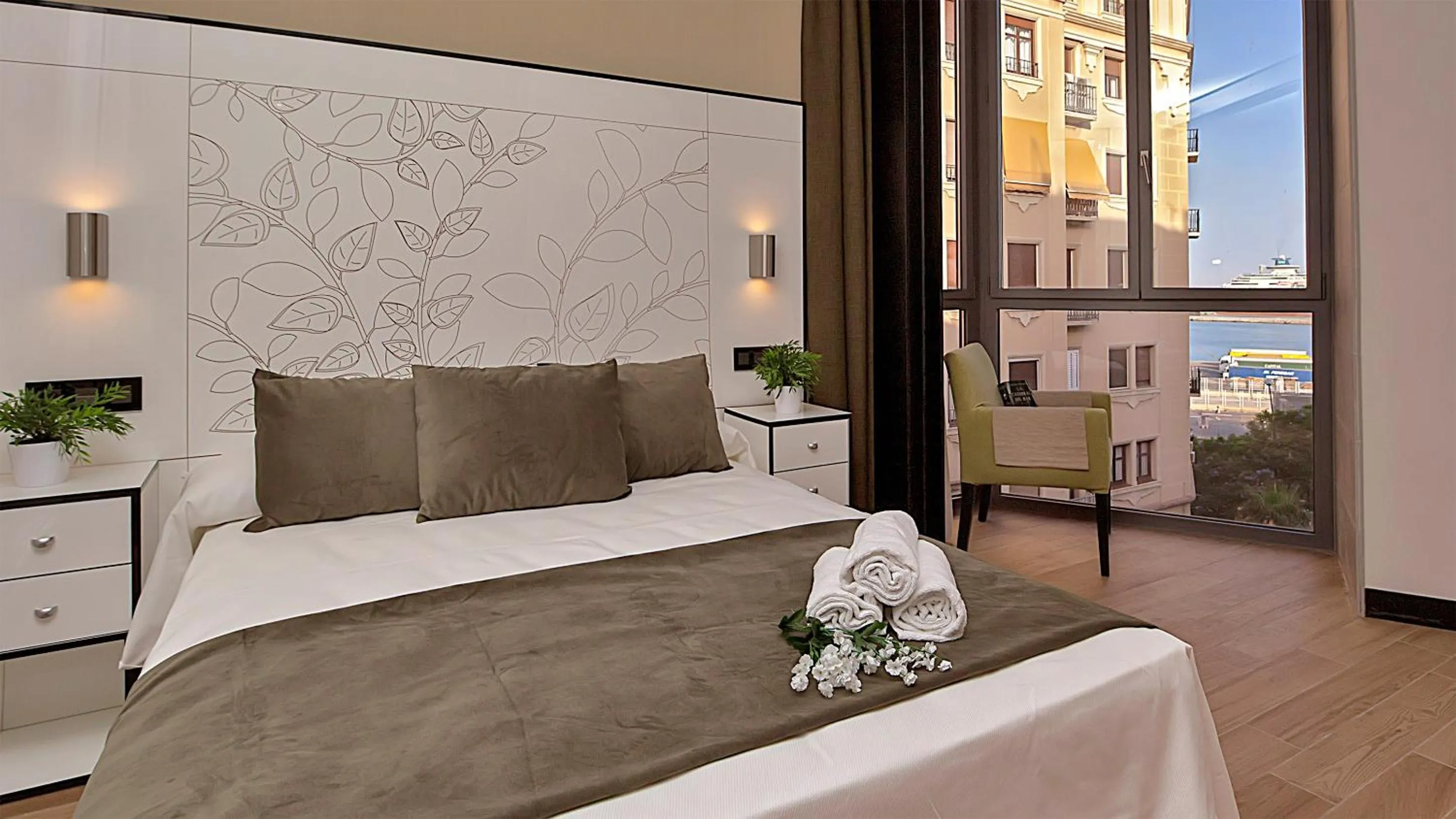 Photo of the whole room, Bed in Apartamentos Suites Oficentro Deluxe