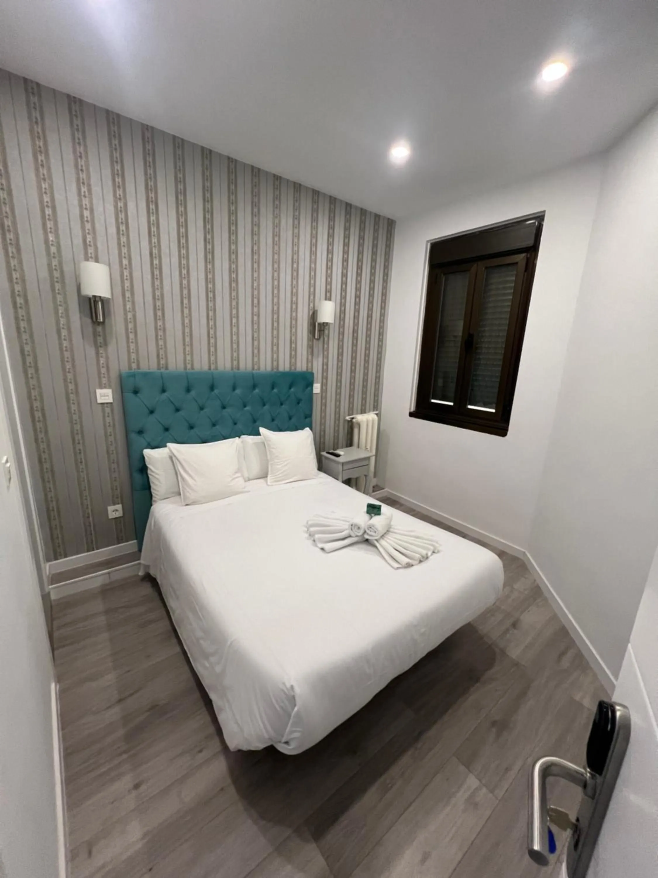 Bed in Hostal Galaico