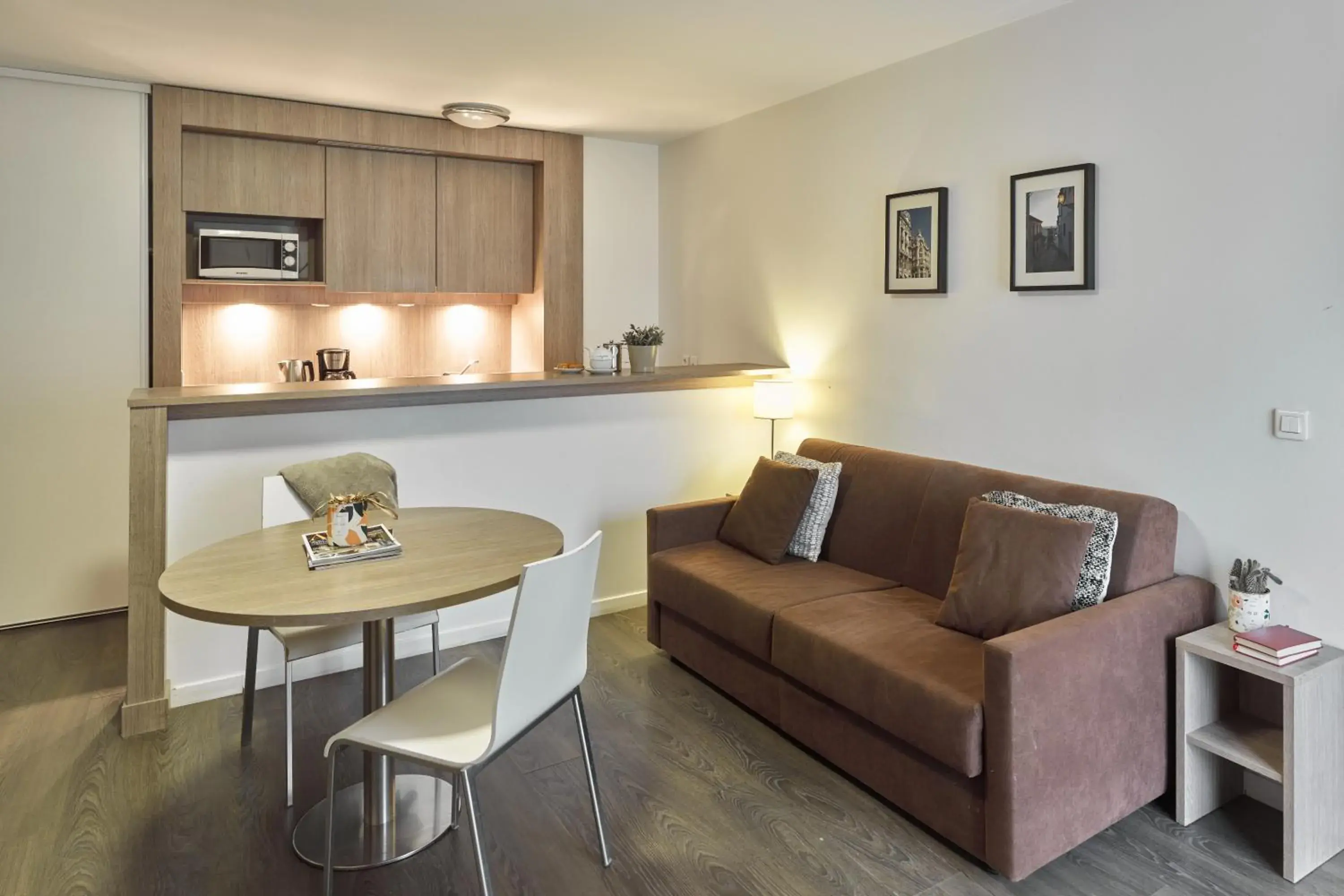 Living room in Zenitude Hôtel Résidences Roissy Village Living room in Zenitude Hôtel Résidences Roissy Village