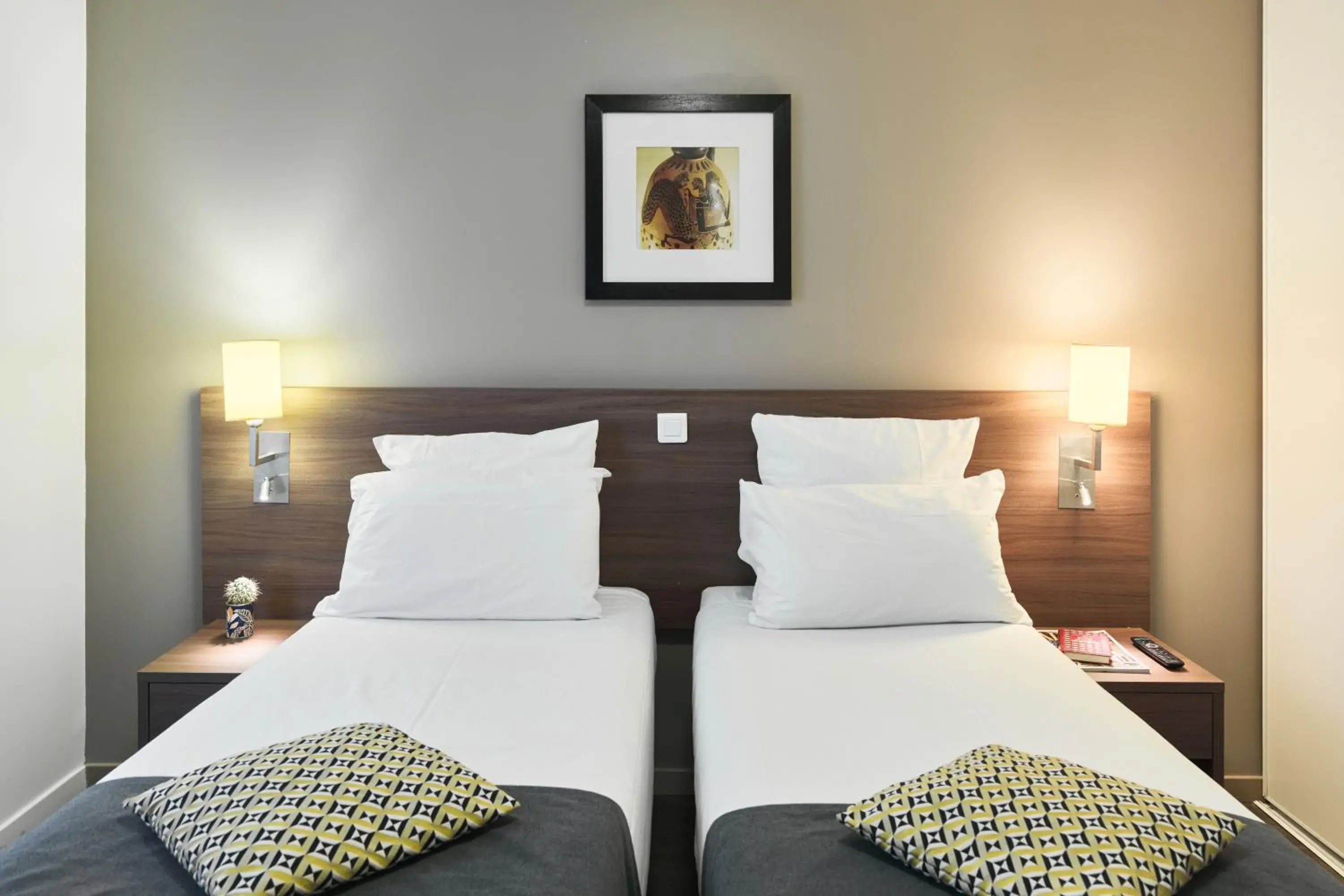 Bed in Zenitude Hôtel Résidences Roissy Village Bed in Zenitude Hôtel Résidences Roissy Village