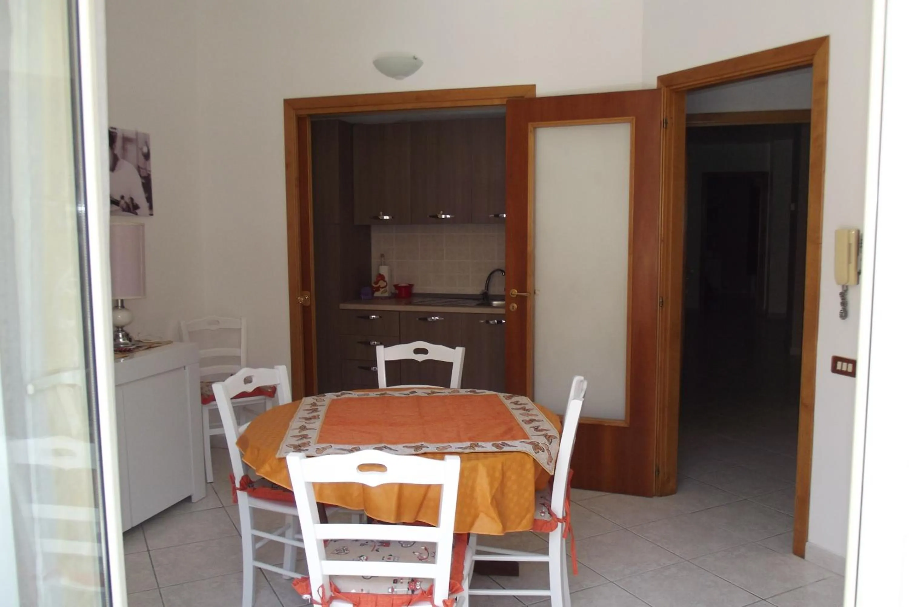 Communal lounge/ TV room in B&B Salita Metello