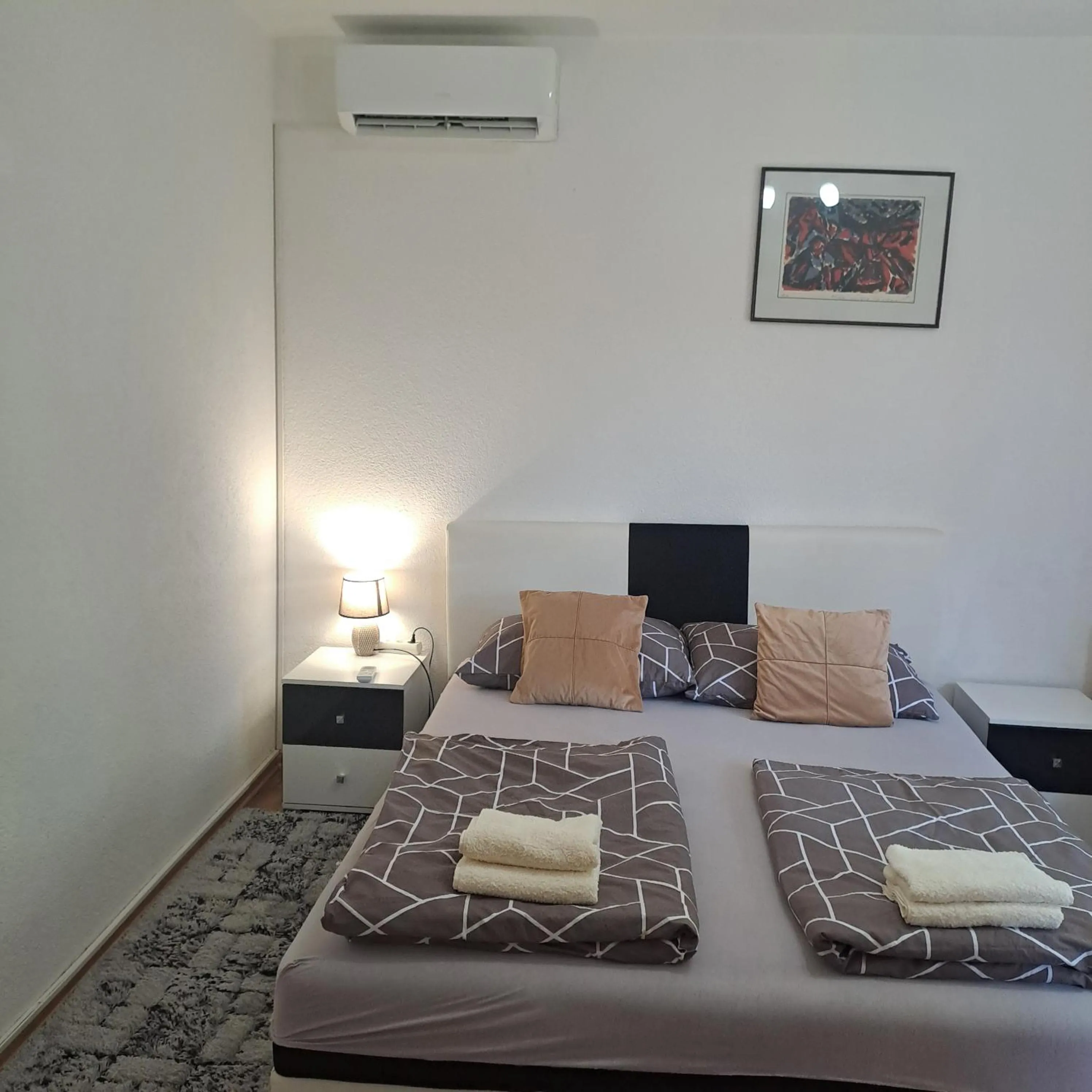 Bed in Apartment Beha