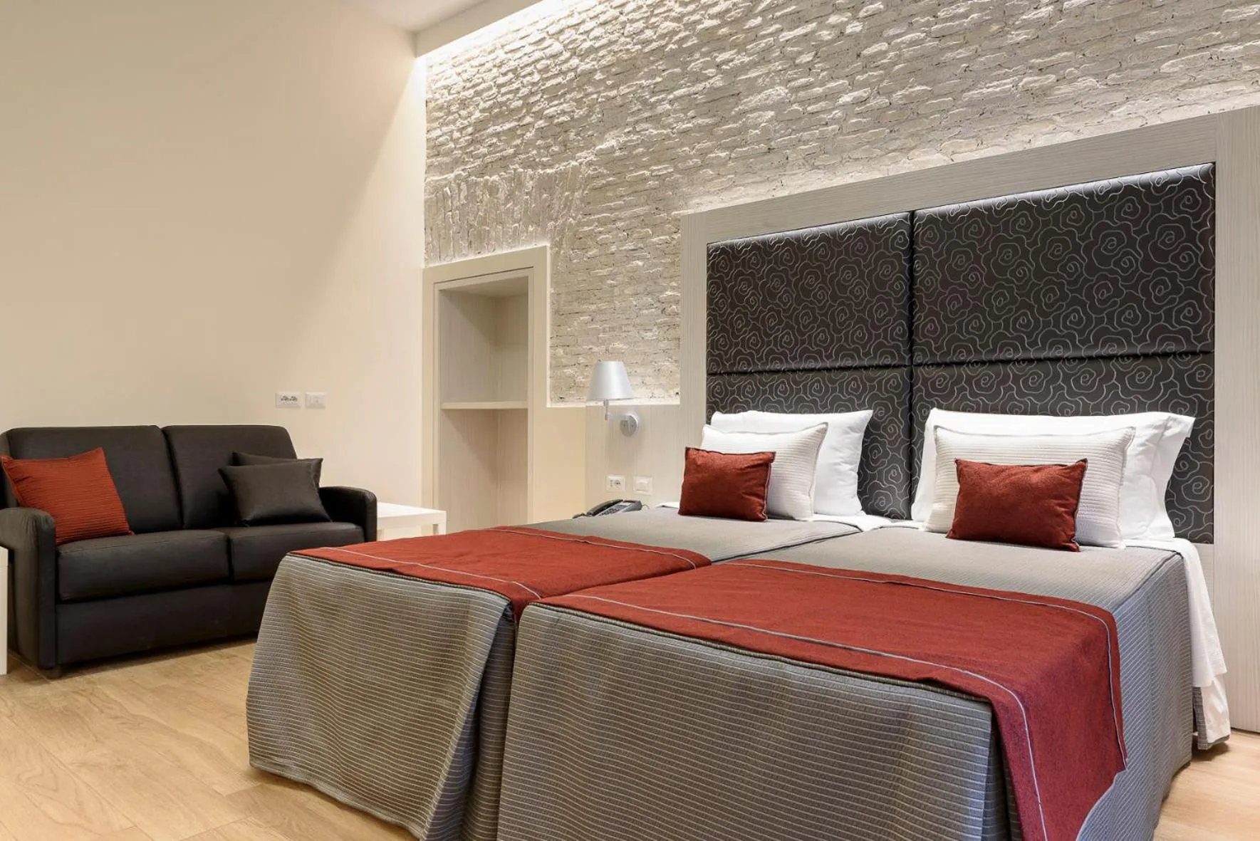 Bed in Navona Luxury Guesthouse