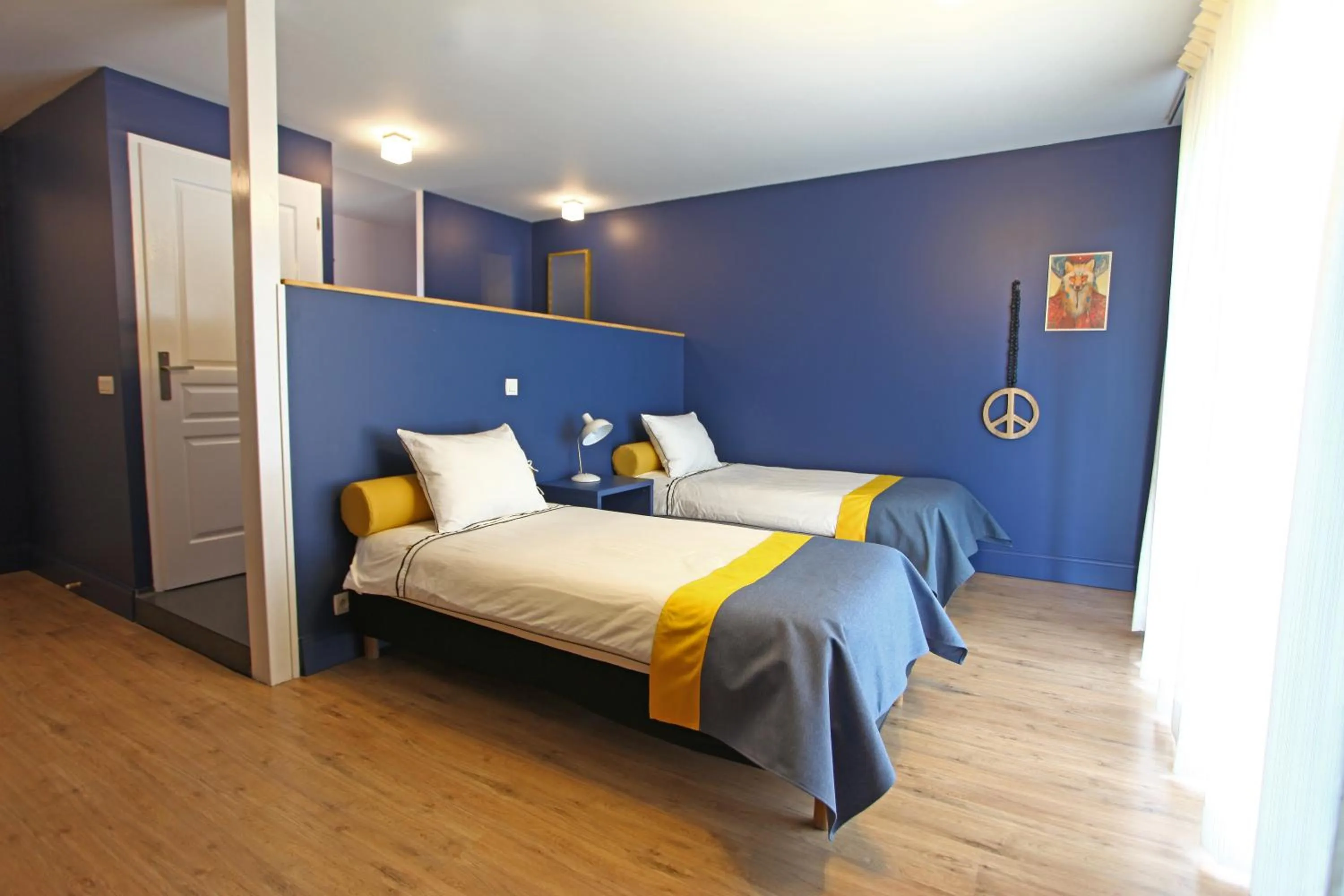 Bed in La Petite Couronne, Ecolodge & Lofts