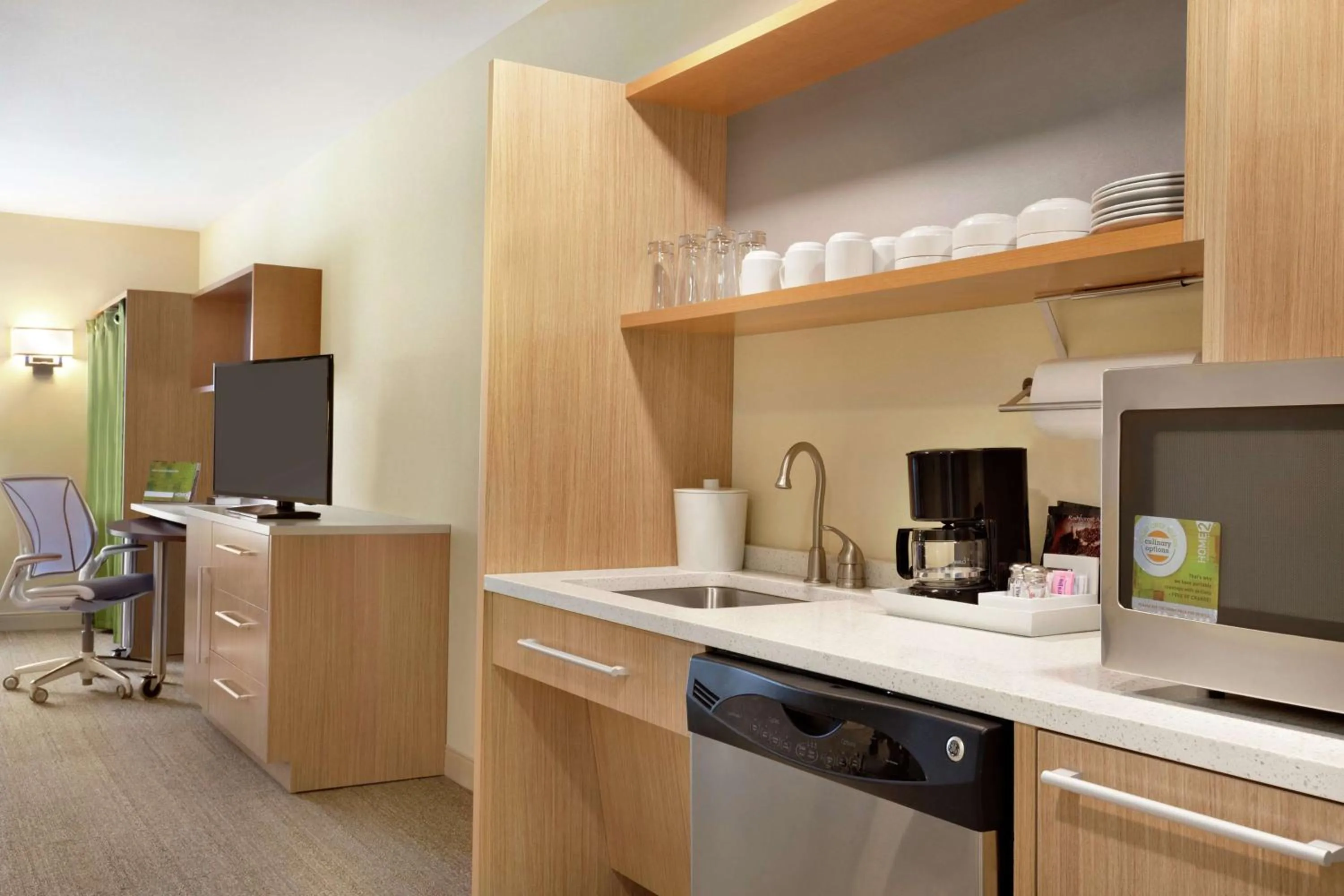 Kitchen or kitchenette in Home2 Suites by Hilton Grovetown Augusta Area