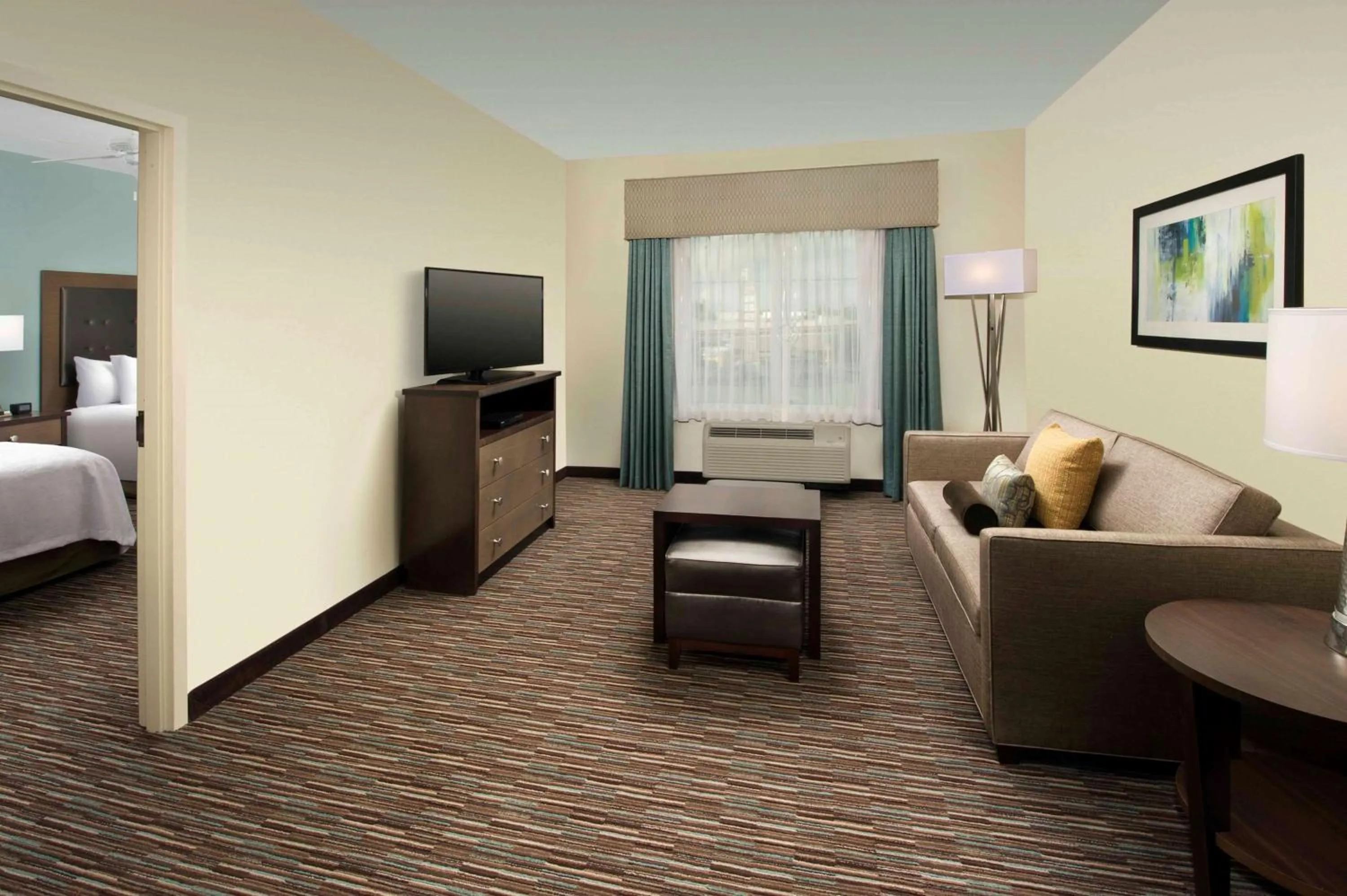 Living room, Bed in Homewood Suites San Antonio Airport