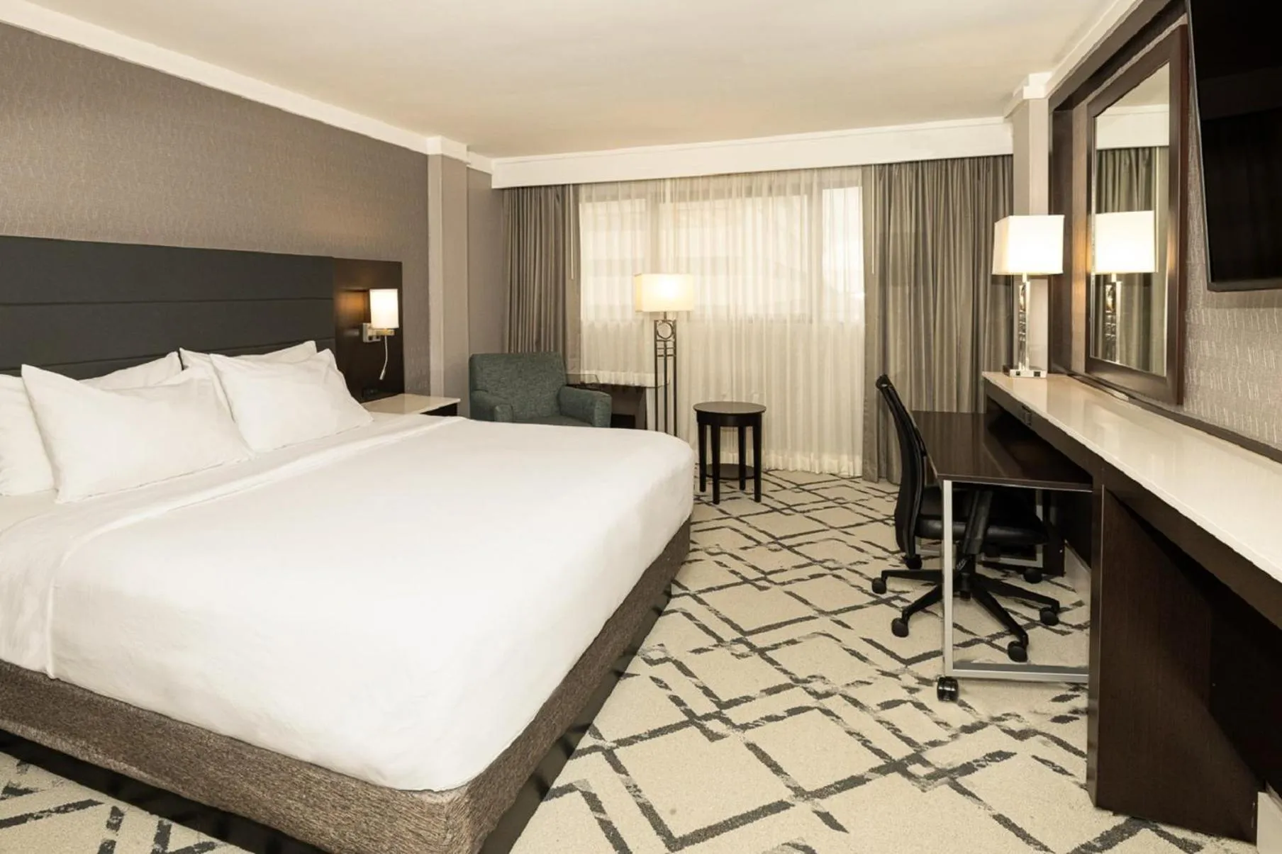 Photo of the whole room, Bed in Crowne Plaza Knoxville Downtown University by IHG