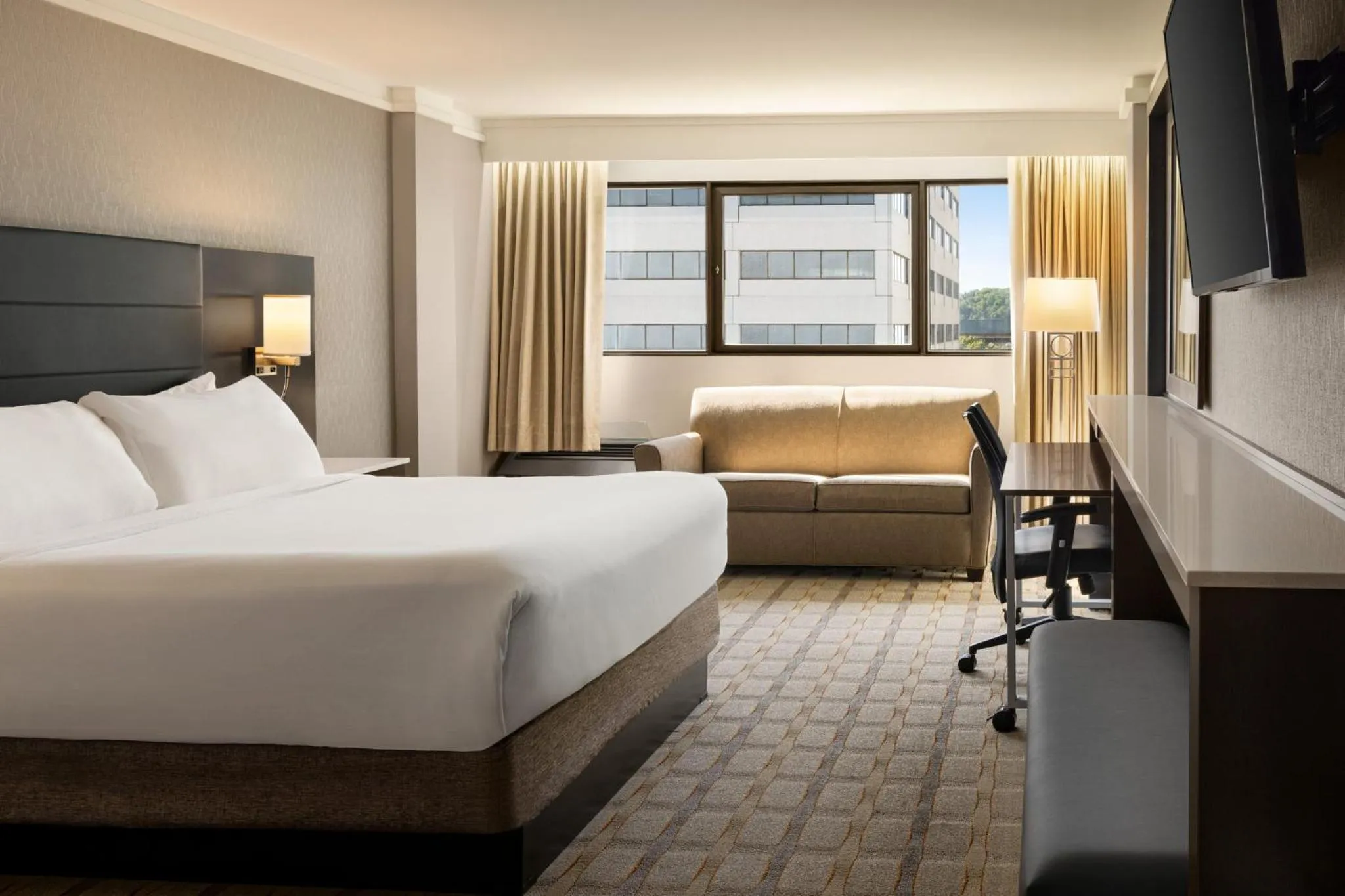 Photo of the whole room, Bed in Crowne Plaza Knoxville Downtown University by IHG