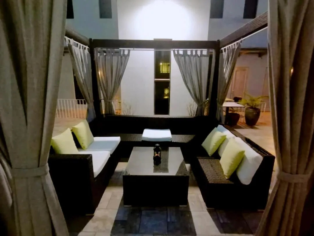 Seating area in Bei Boutique Hotel