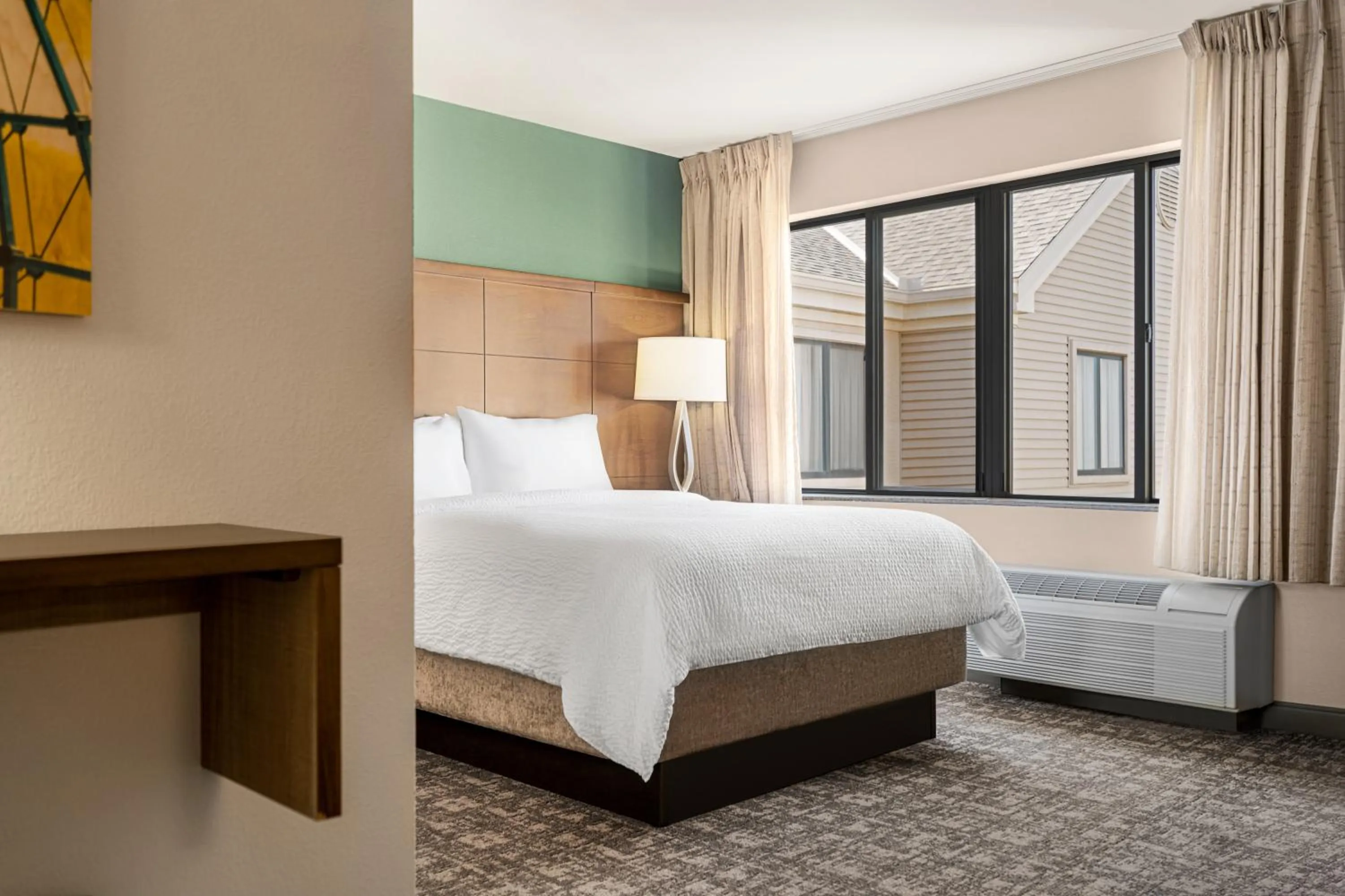 Bed in Staybridge Suites Oklahoma City-Quail Springs by IHG