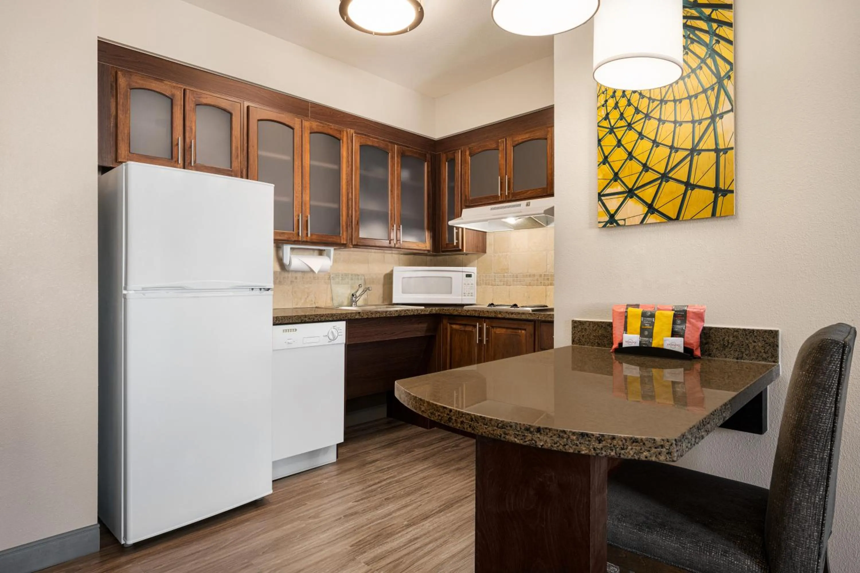 kitchen in Staybridge Suites Oklahoma City-Quail Springs by IHG