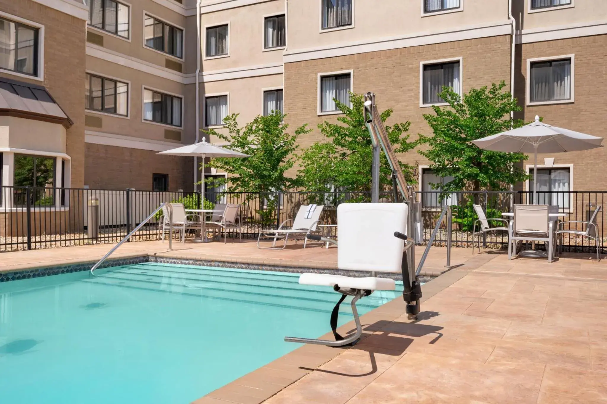 Swimming pool in Staybridge Suites Oklahoma City-Quail Springs by IHG Swimming pool in Staybridge Suites Oklahoma City-Quail Springs by IHG
