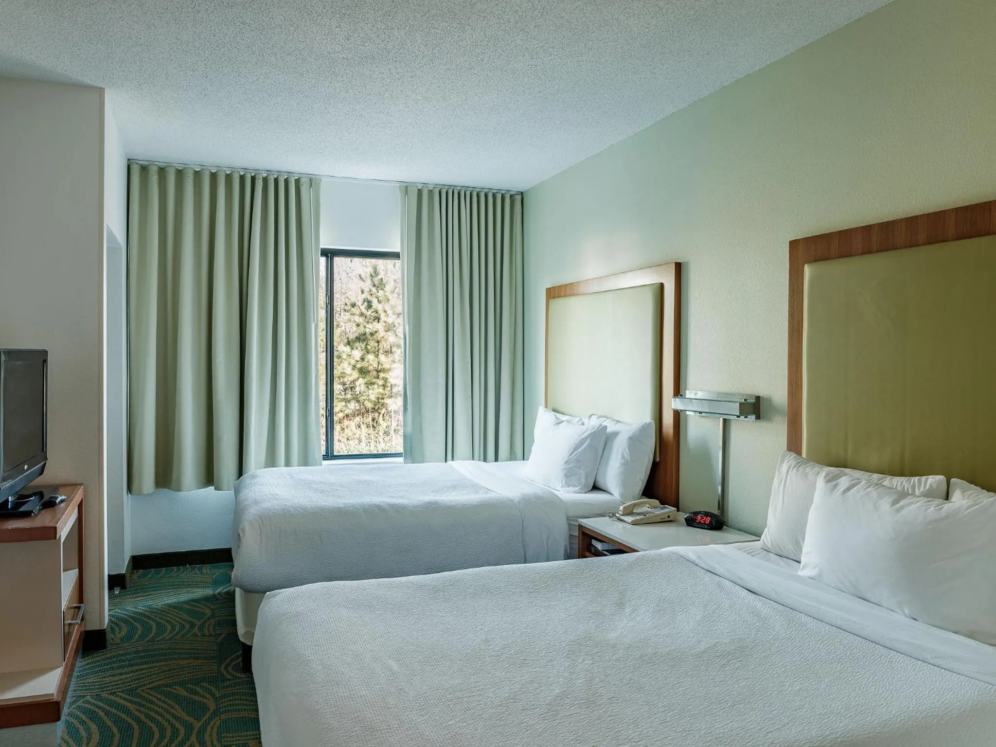 Bed in The Beacon Charlotte Airport by IHG