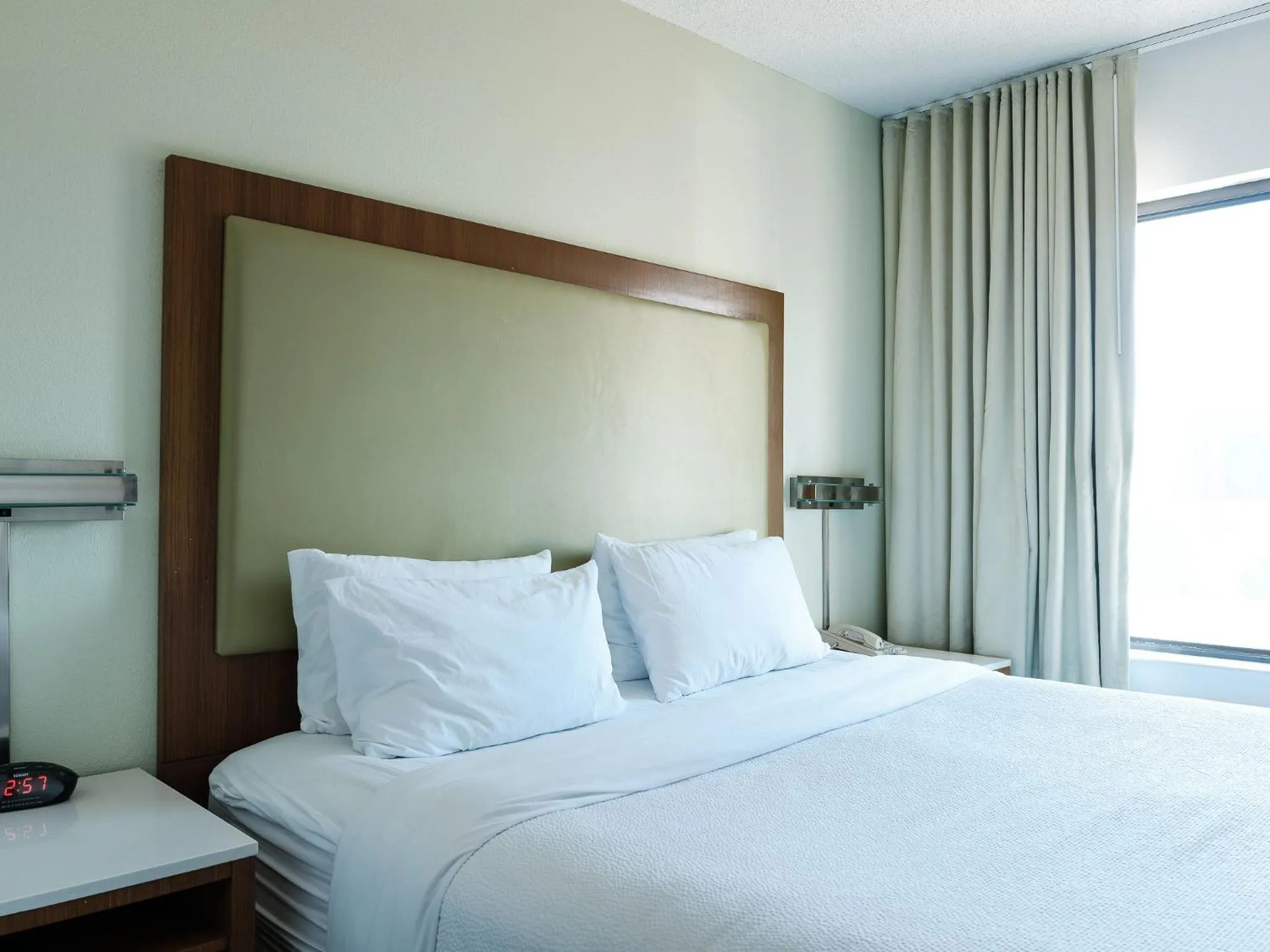 Bed in The Beacon Charlotte Airport by IHG