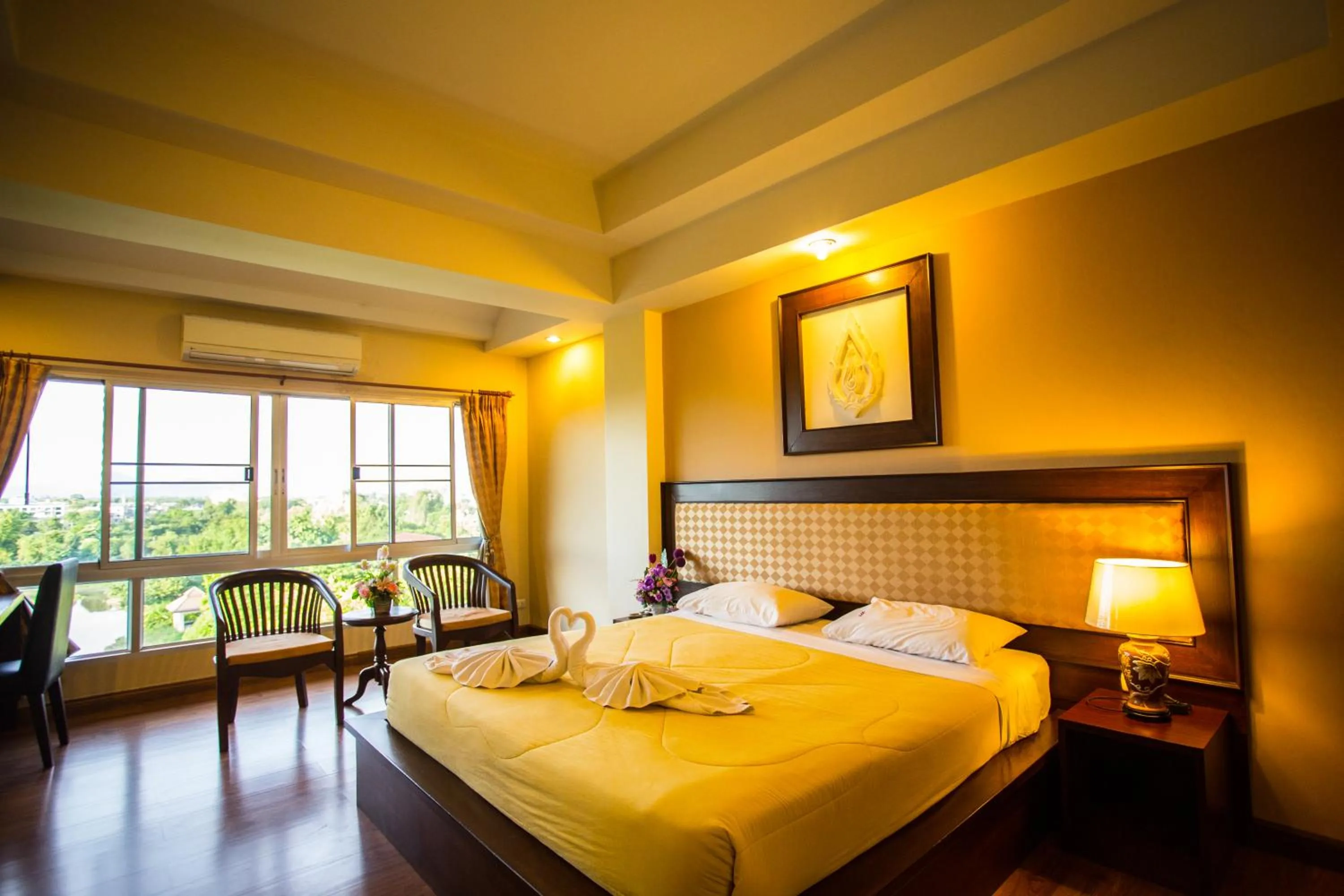 Bed in Madina Rayong Hotel