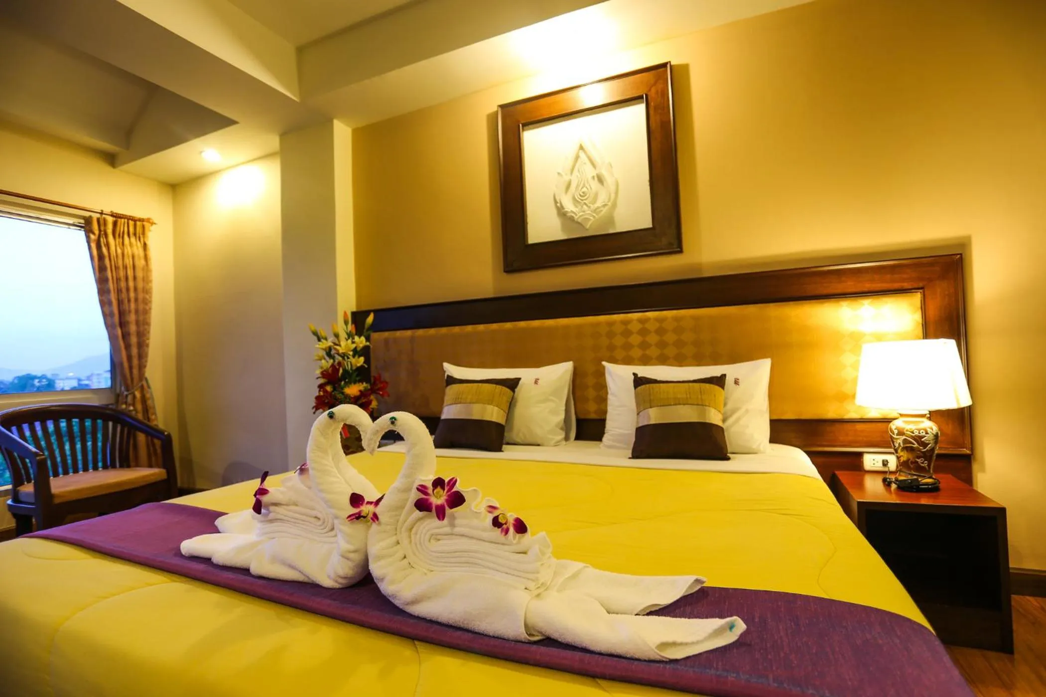 Bed in Madina Rayong Hotel